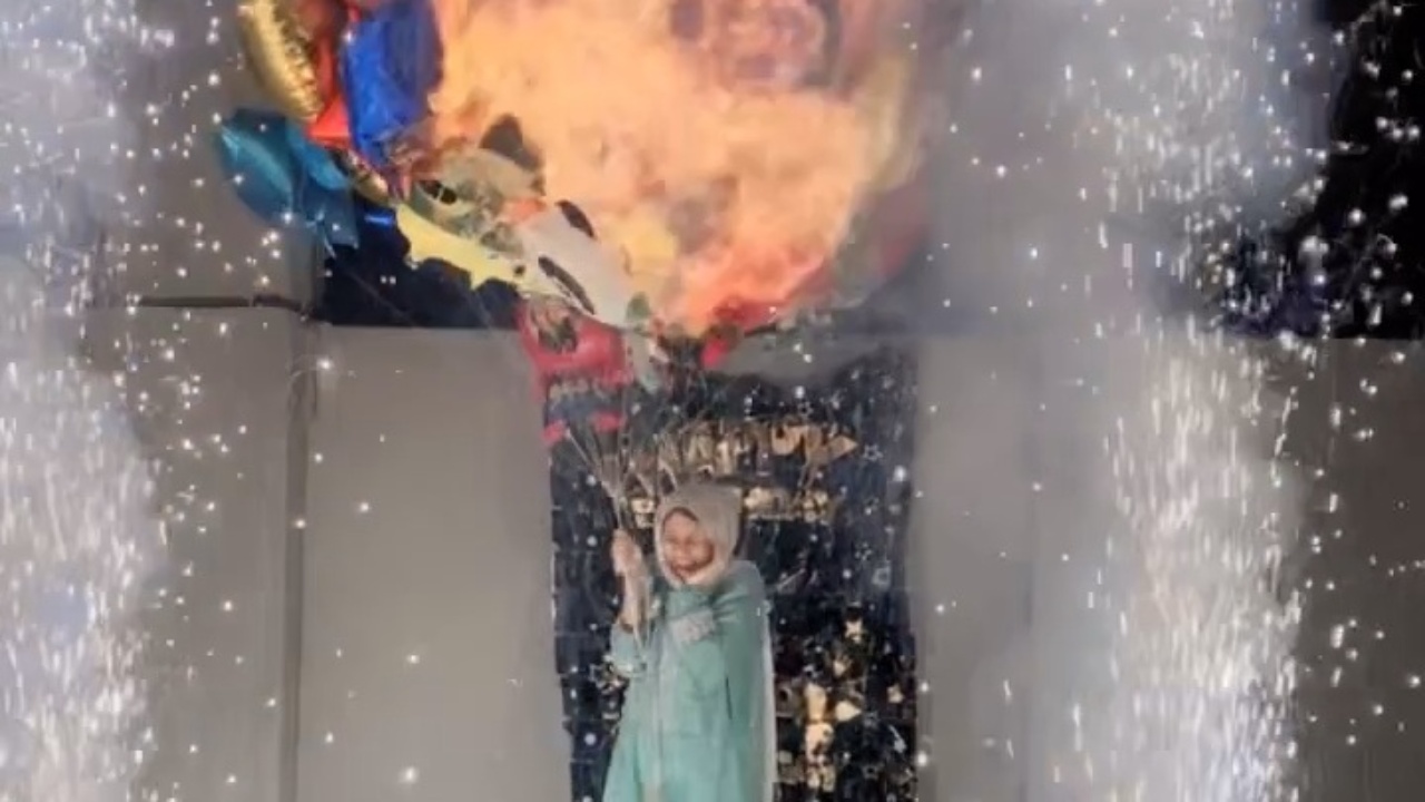 Helium balloons burst as fire is caught indoors