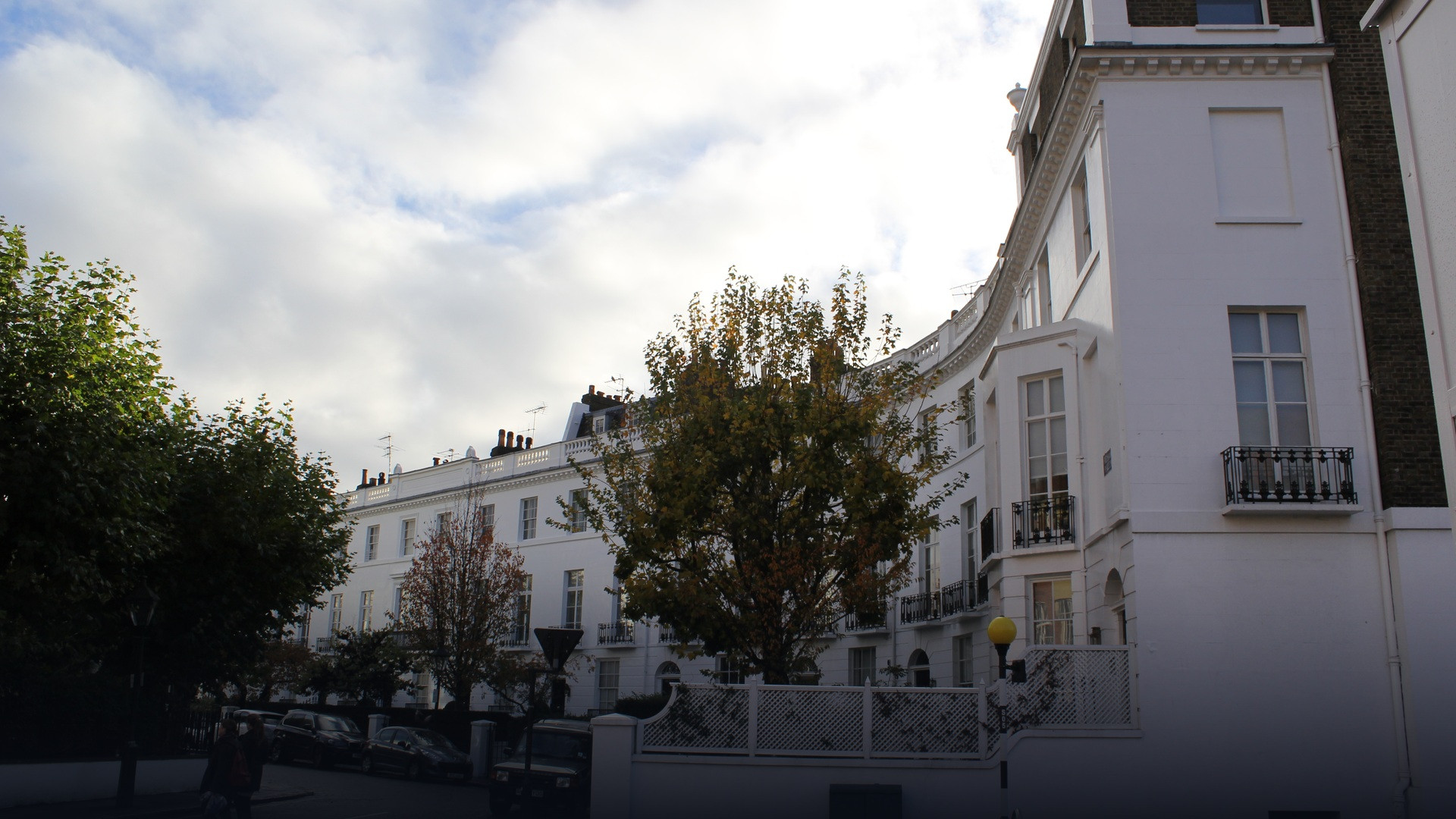 Row of classic Victorian terraced residential houses in London.
