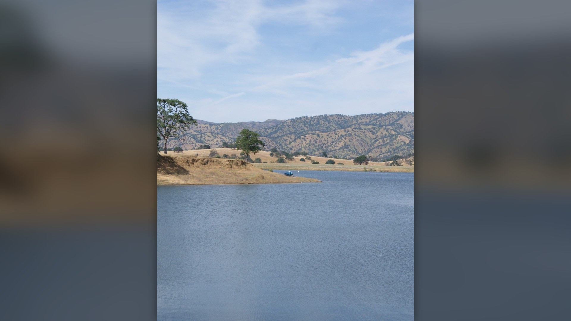 Scenic shoreline and oak hills of Lake Berryessa in Northern California