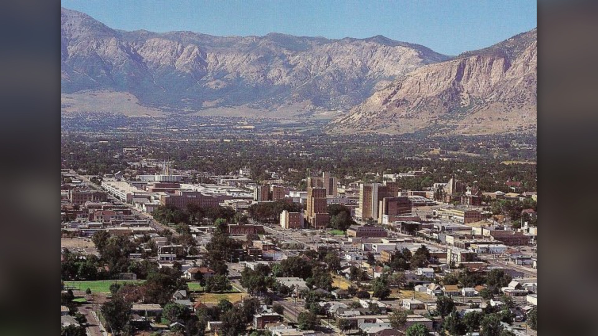 Downtown Ogden, Utah with the Wasatch Mountain range rising behind it.