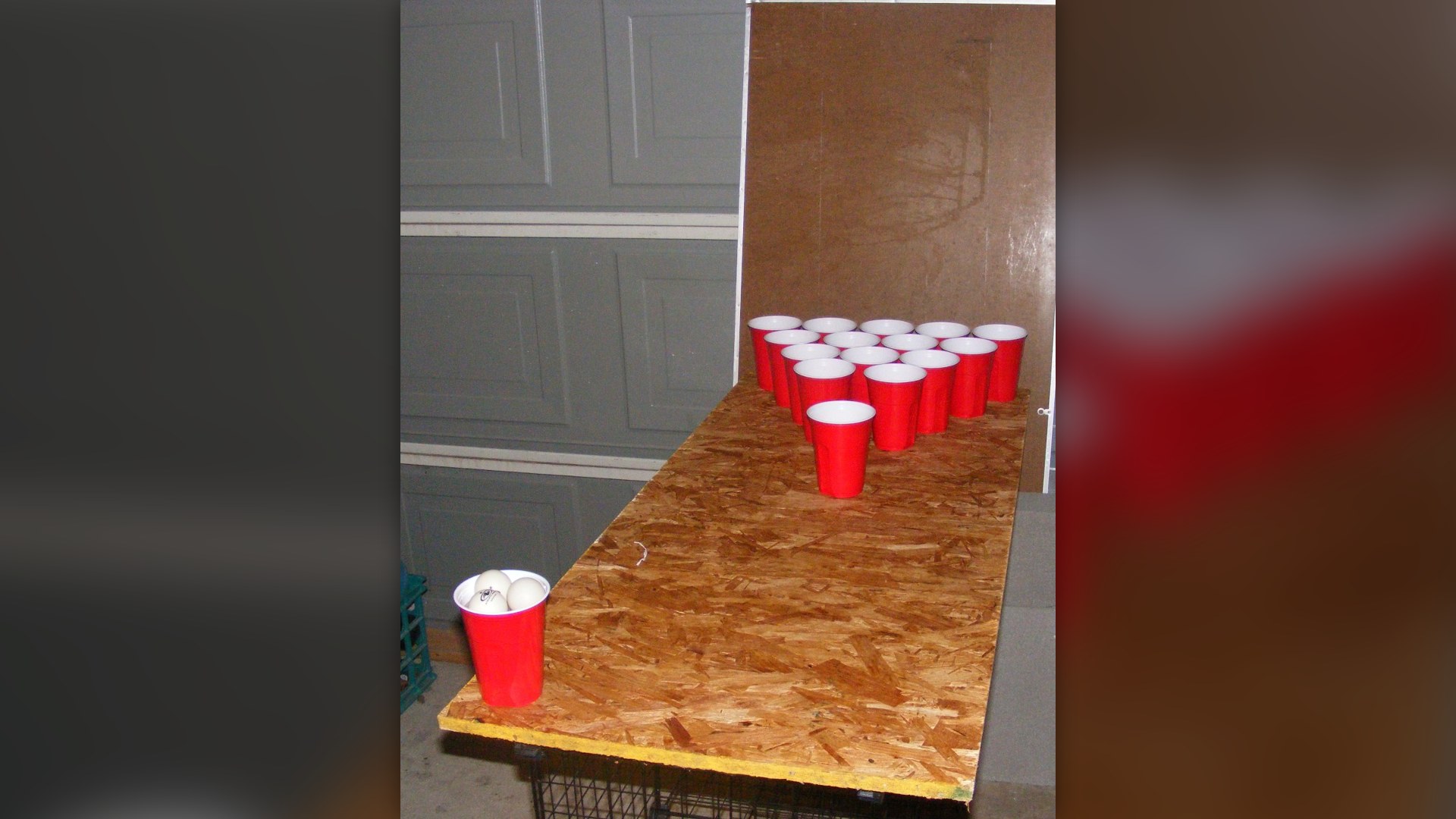 Red plastic cups set up on a party table