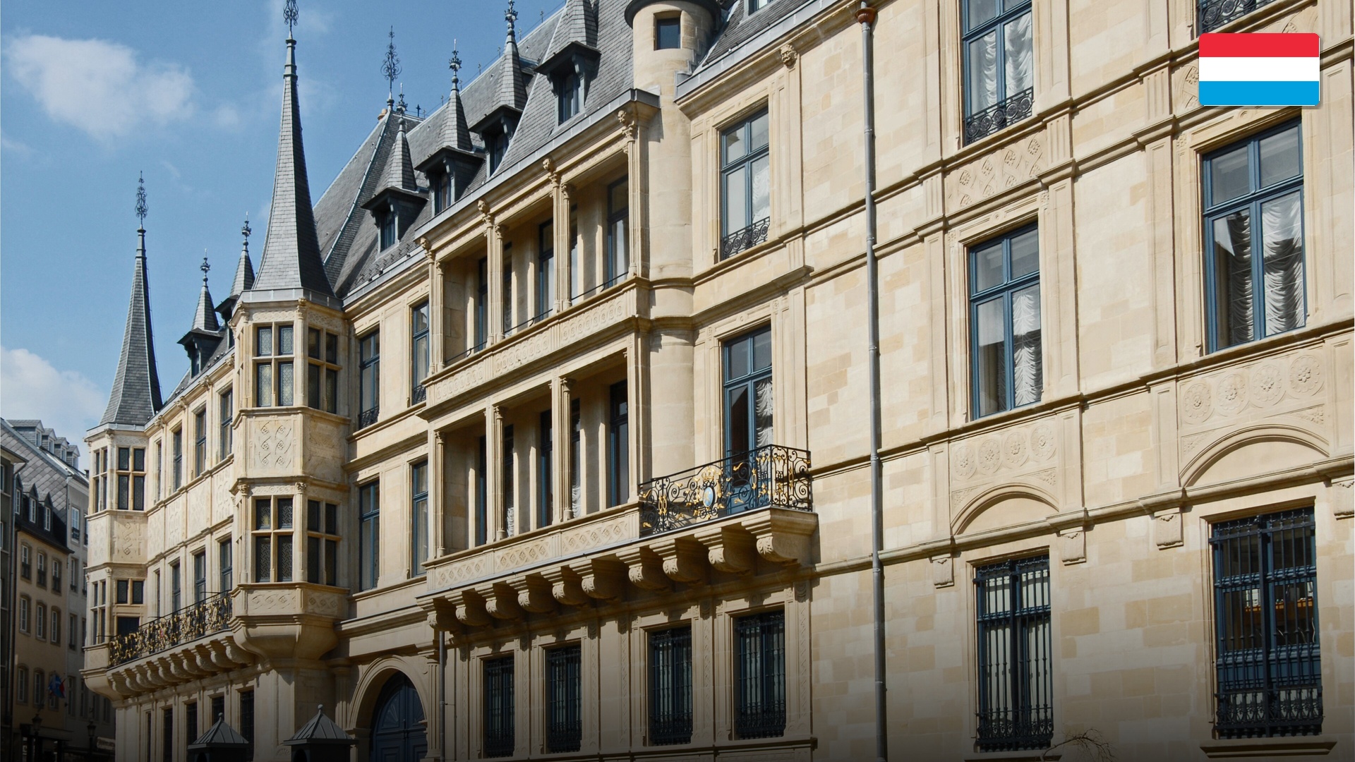 Historic fortified stone walls and picturesque river quarter of the Grund in Luxembourg City.
