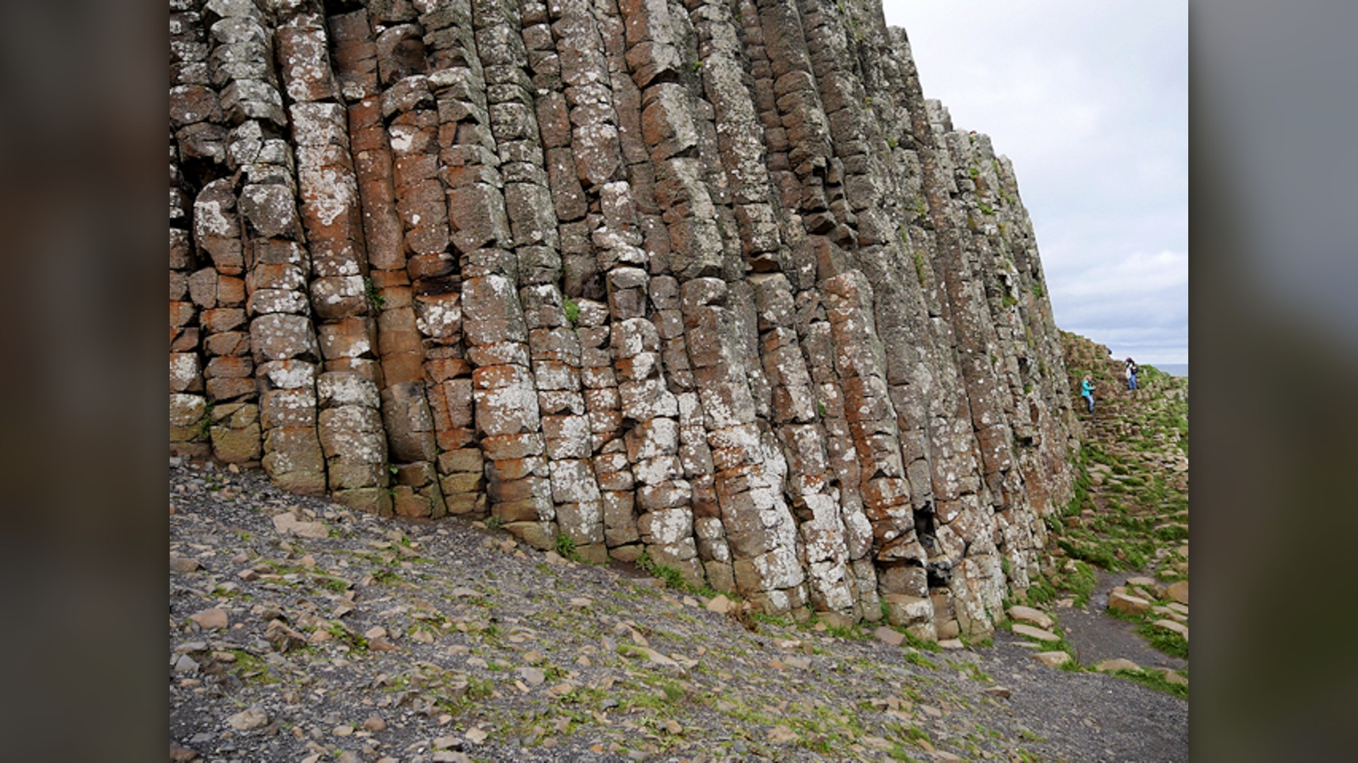Interlocking hexagonal basalt rock columns at the Giant's Causeway in County Antrim, Northern Ireland.
