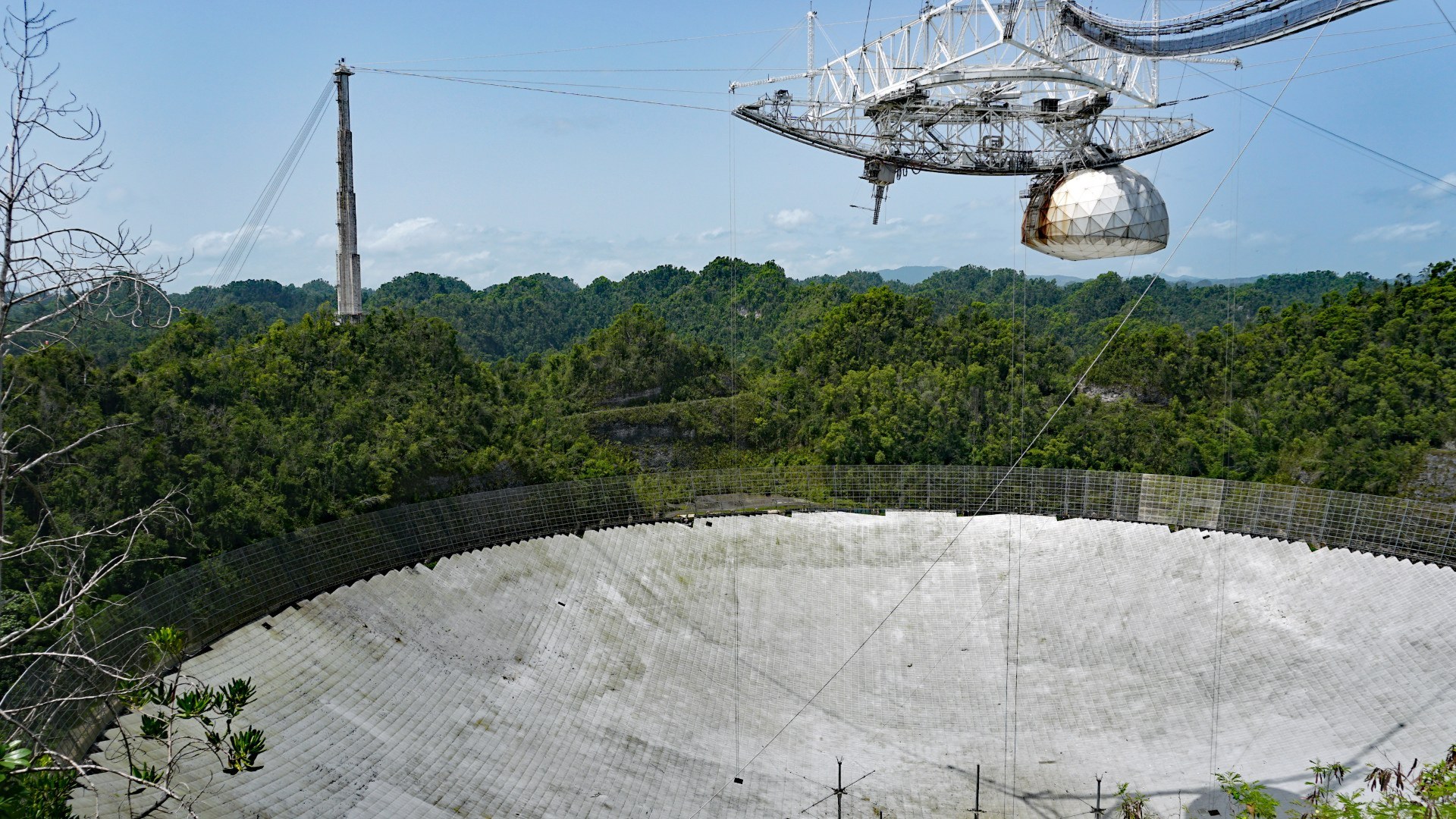 Aerial view of the 305-meter Arecibo Observatory radio telescope dish in Puerto Rico.
