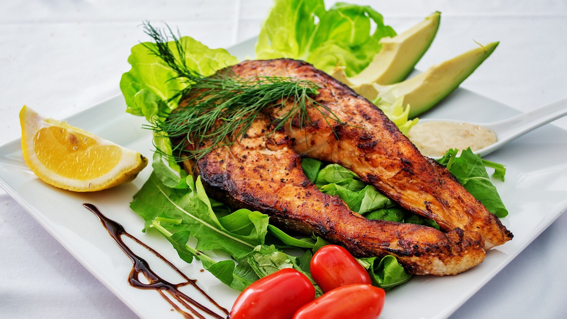 Grilled wild salmon fillet rich in Omega-3 fatty acids and protein