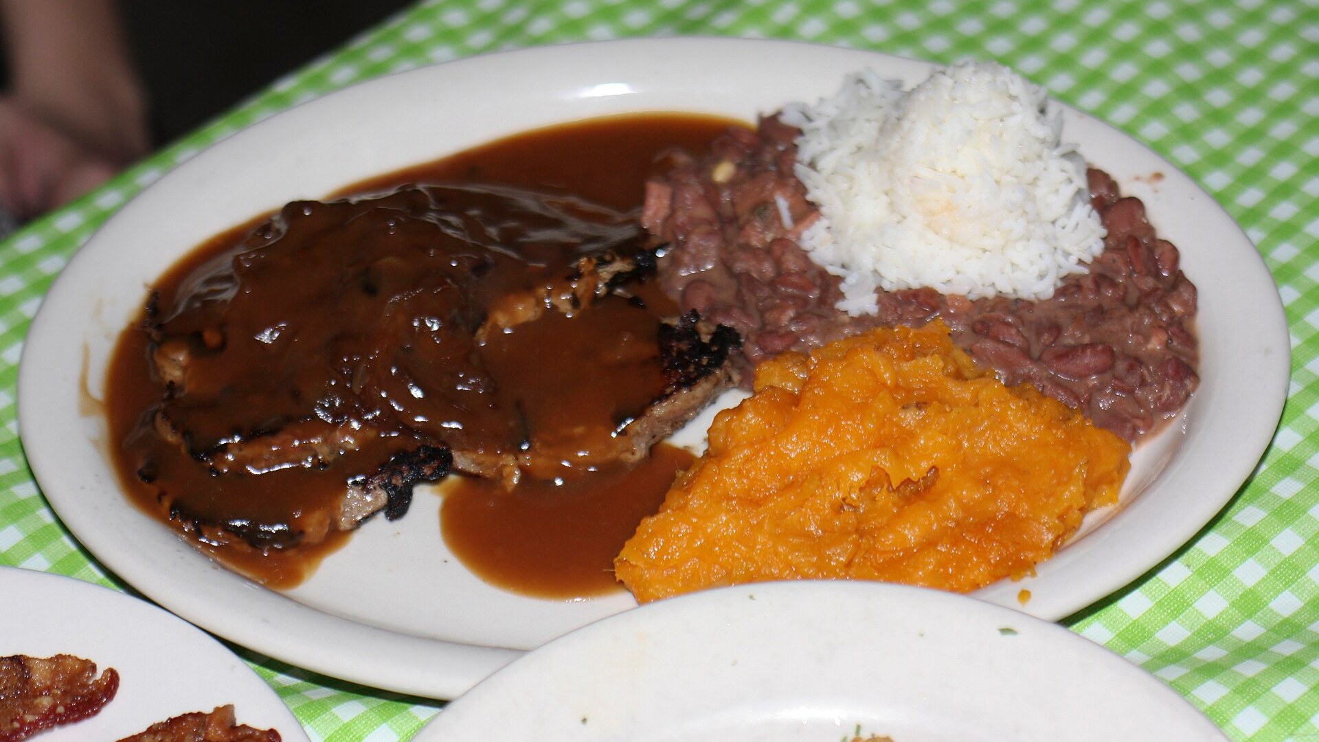 Cooked calf liver with onions and brown gravy
