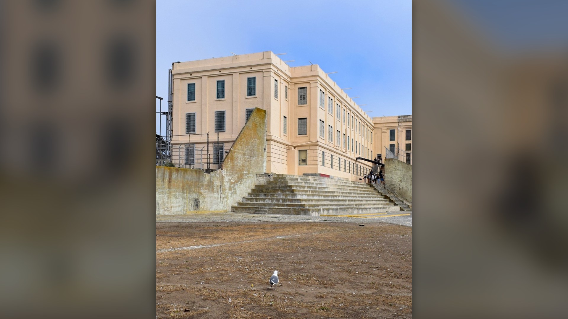 Recreation yard and concrete cellhouse walls of Alcatraz Federal Penitentiary