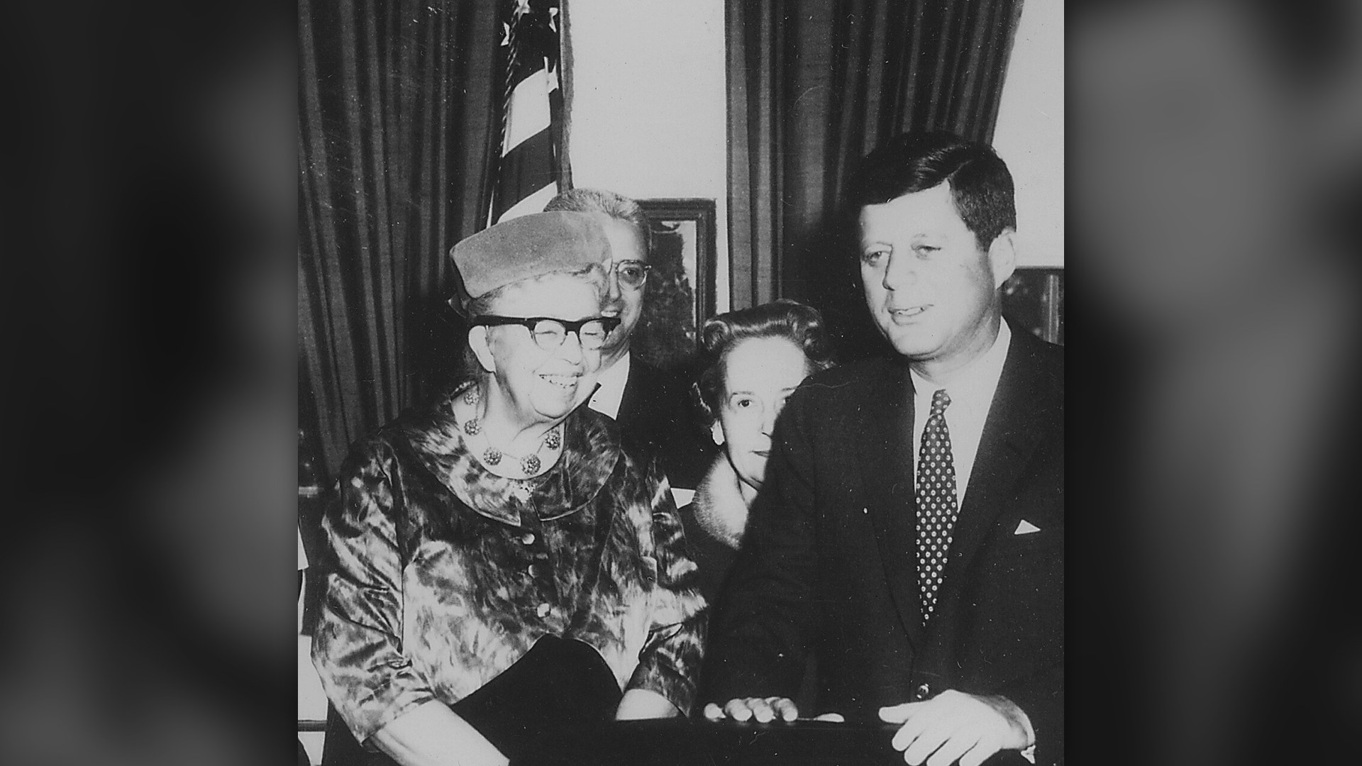 Eleanor Roosevelt meeting with President John F. Kennedy in the Oval Office.