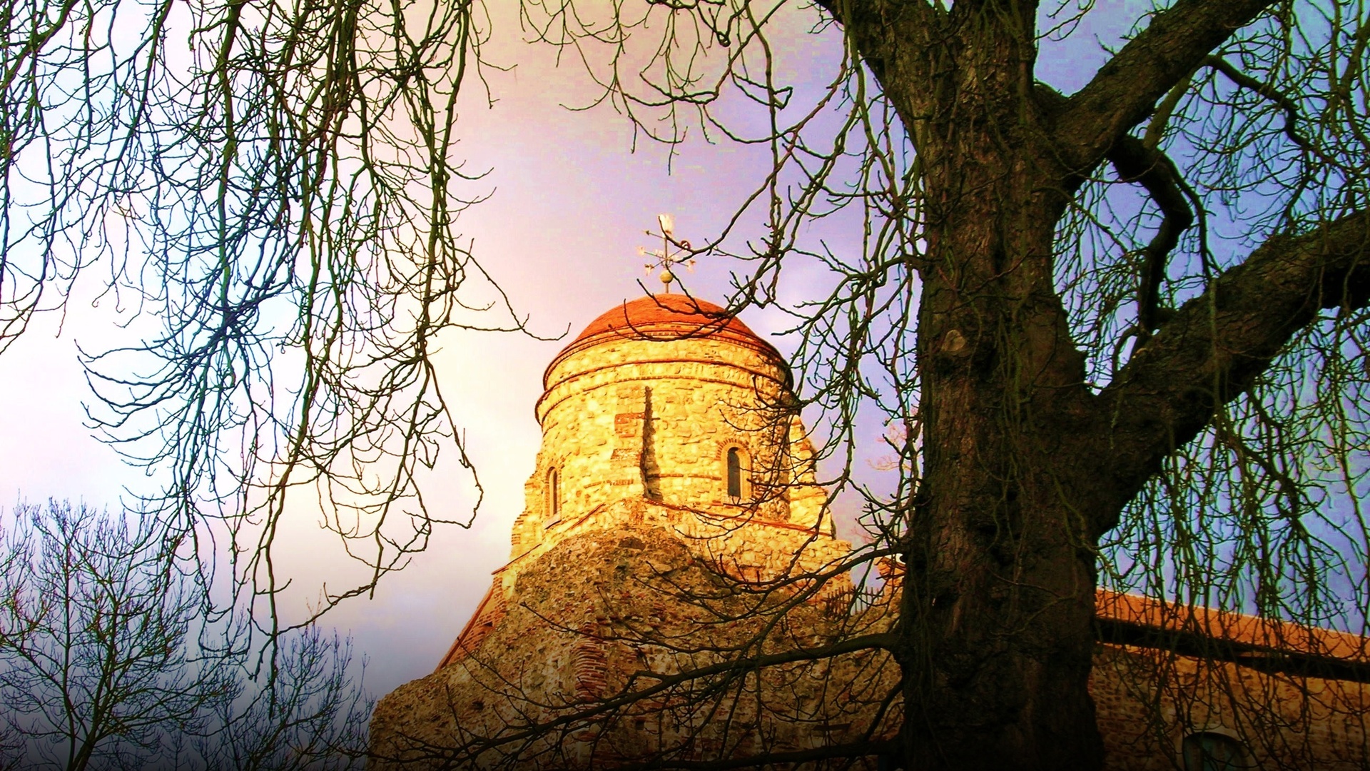 The monumental stone keep and grounds of Norman Colchester Castle in Colchester, Essex.