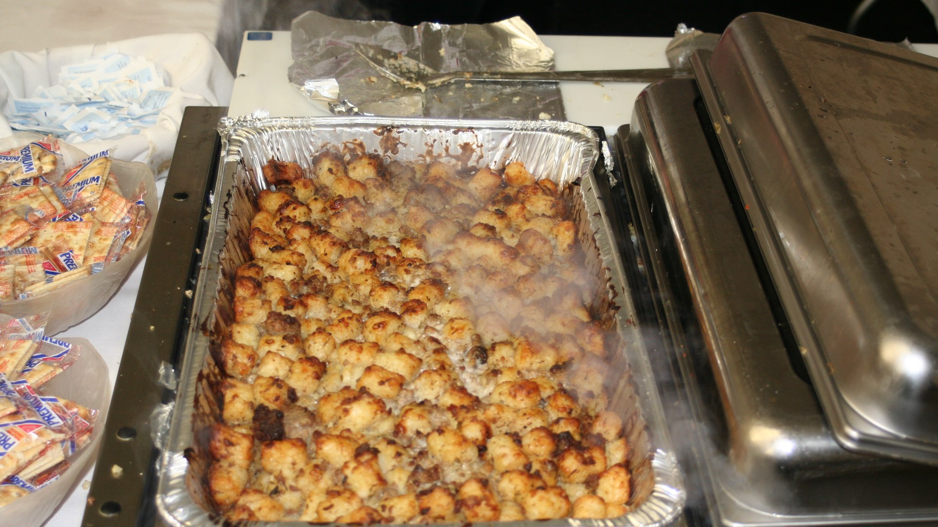 A serving of Minnesota Tater Tot Hotdish baked with ground beef and cream of mushroom soup.