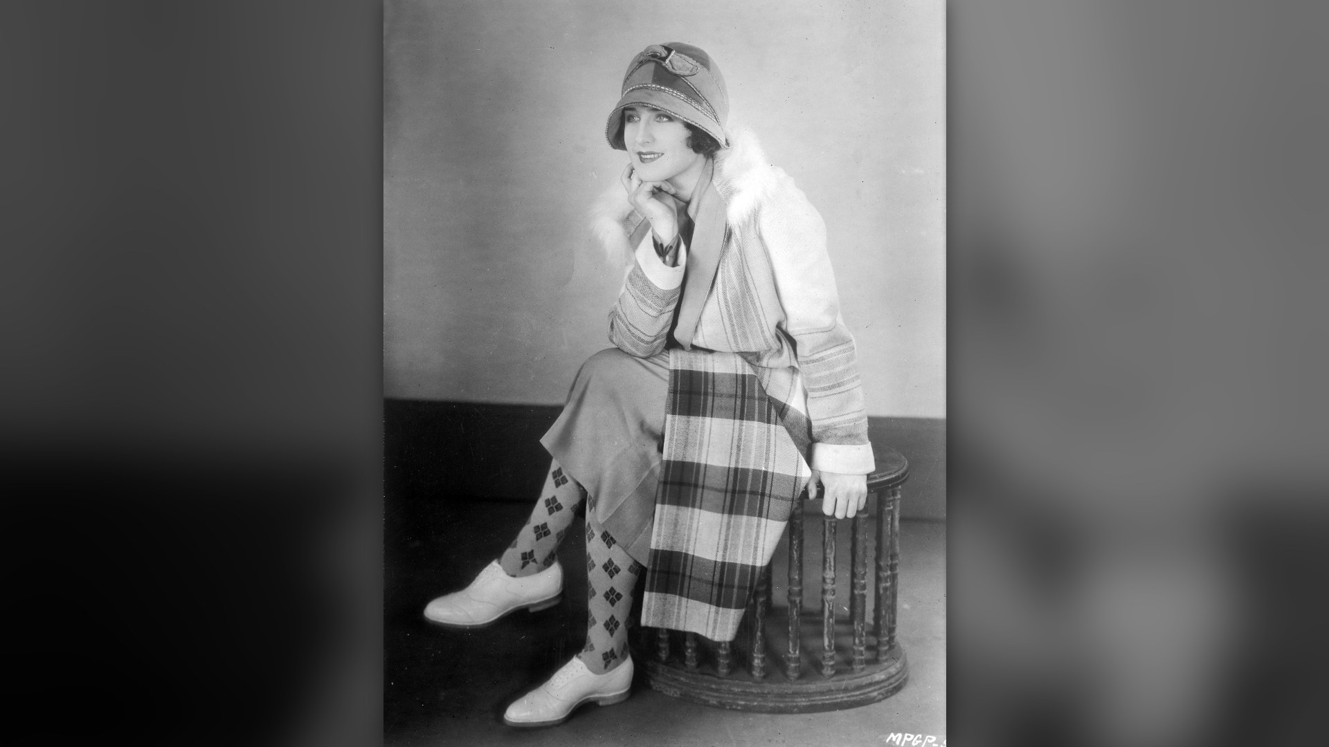 9. Rolling Silk Stockings Below Bare Knees