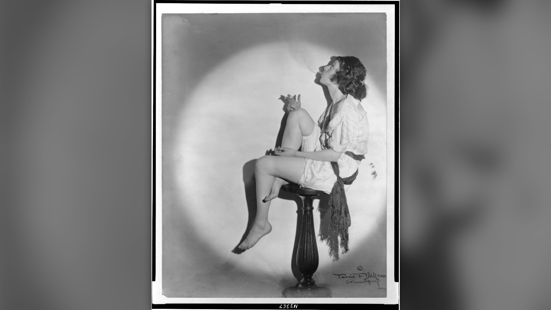 4. Women Lighting Up Cigarettes Outdoors