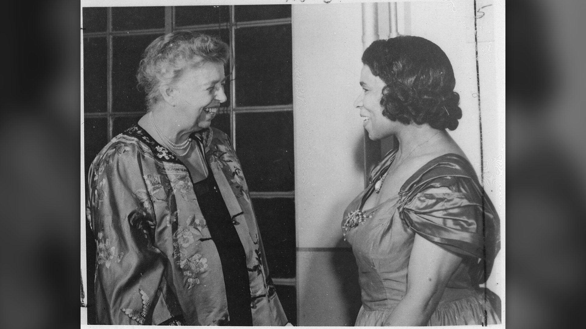 Eleanor Roosevelt conversing warmly with singer Marian Anderson.