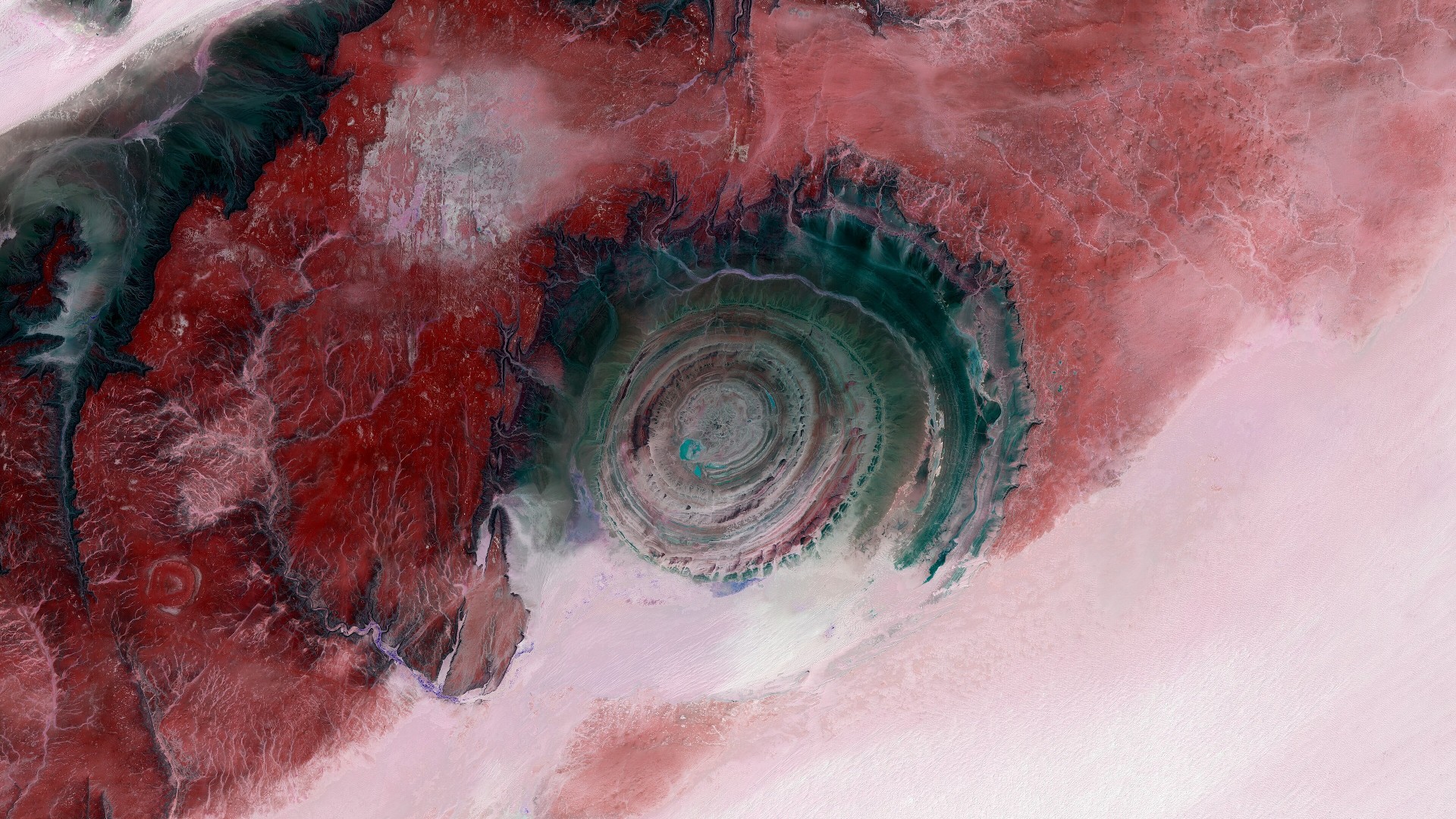 Satellite view of the concentric geological rings of the Richat Structure in the Sahara Desert of Mauritania.