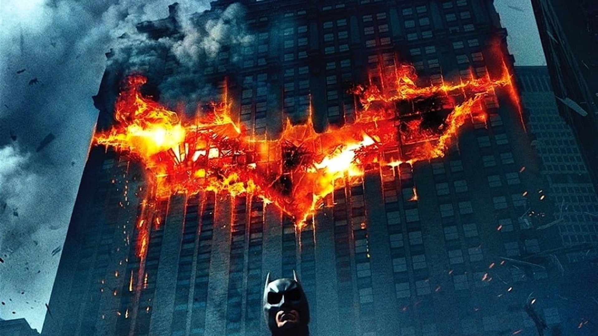 The Dark Knight official movie poster with the iconic burning bat symbol