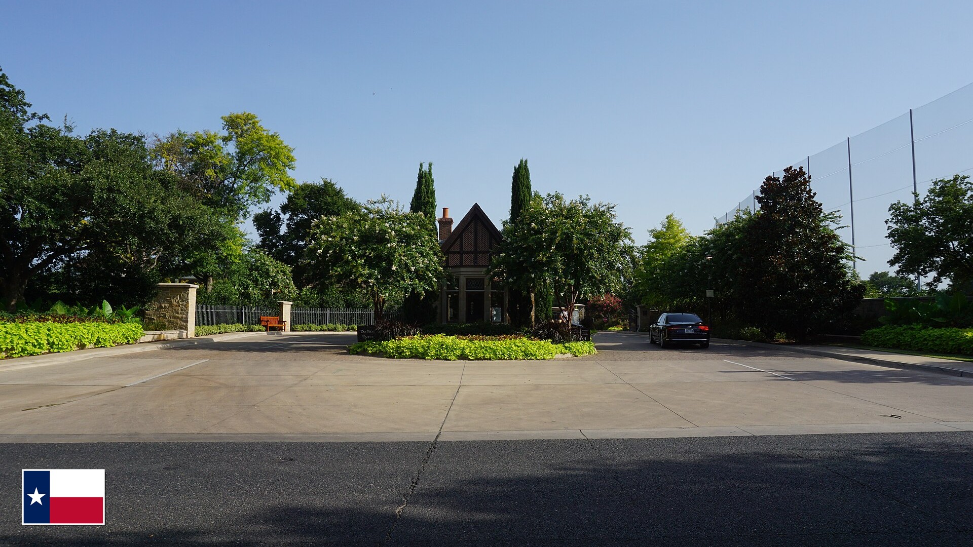 Highland Park, Texas most expensive neighborhood estate with Texas state flag overlay in bottom-left corner