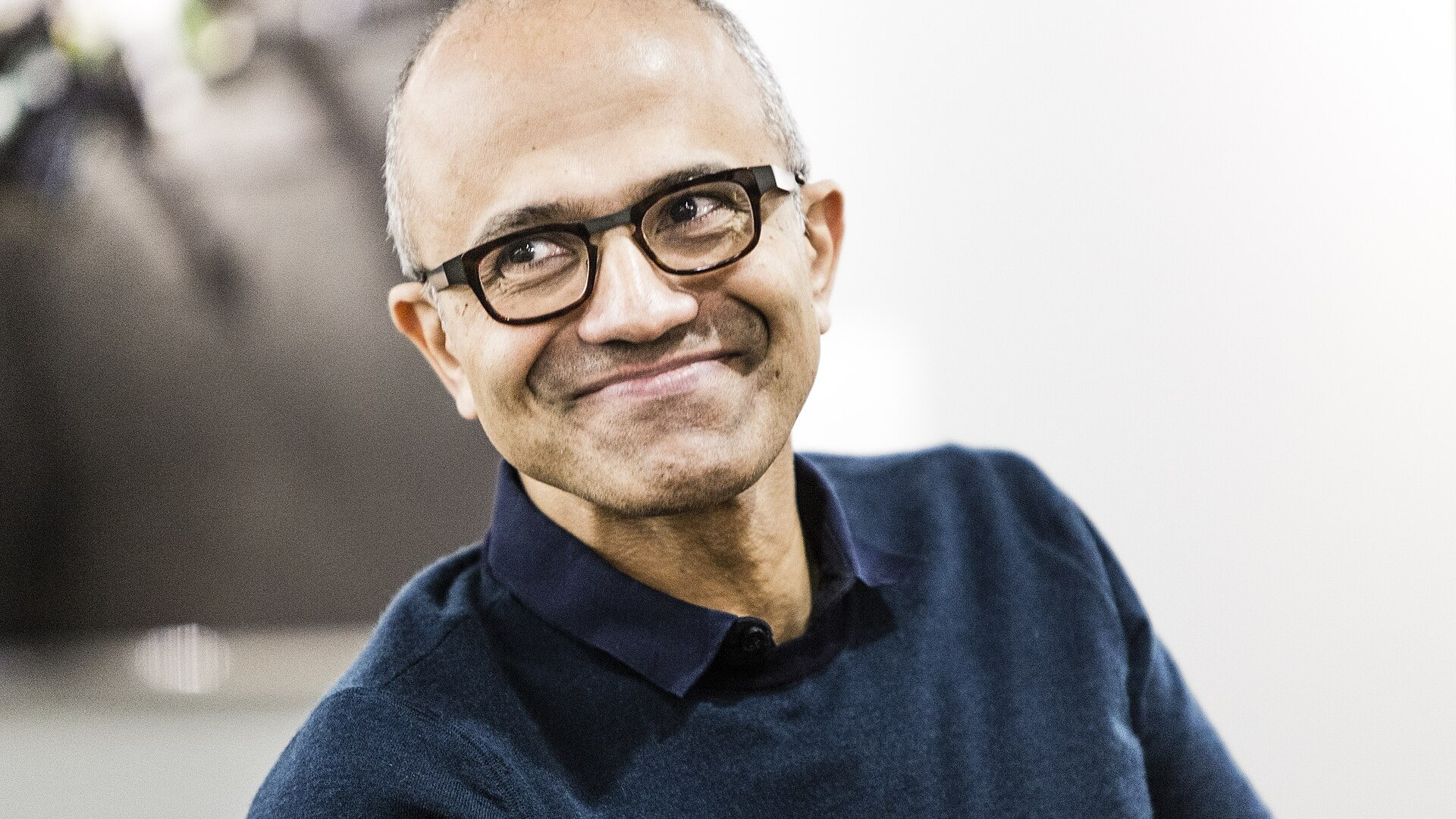 Microsoft CEO Satya Nadella delivering an executive keynote address.