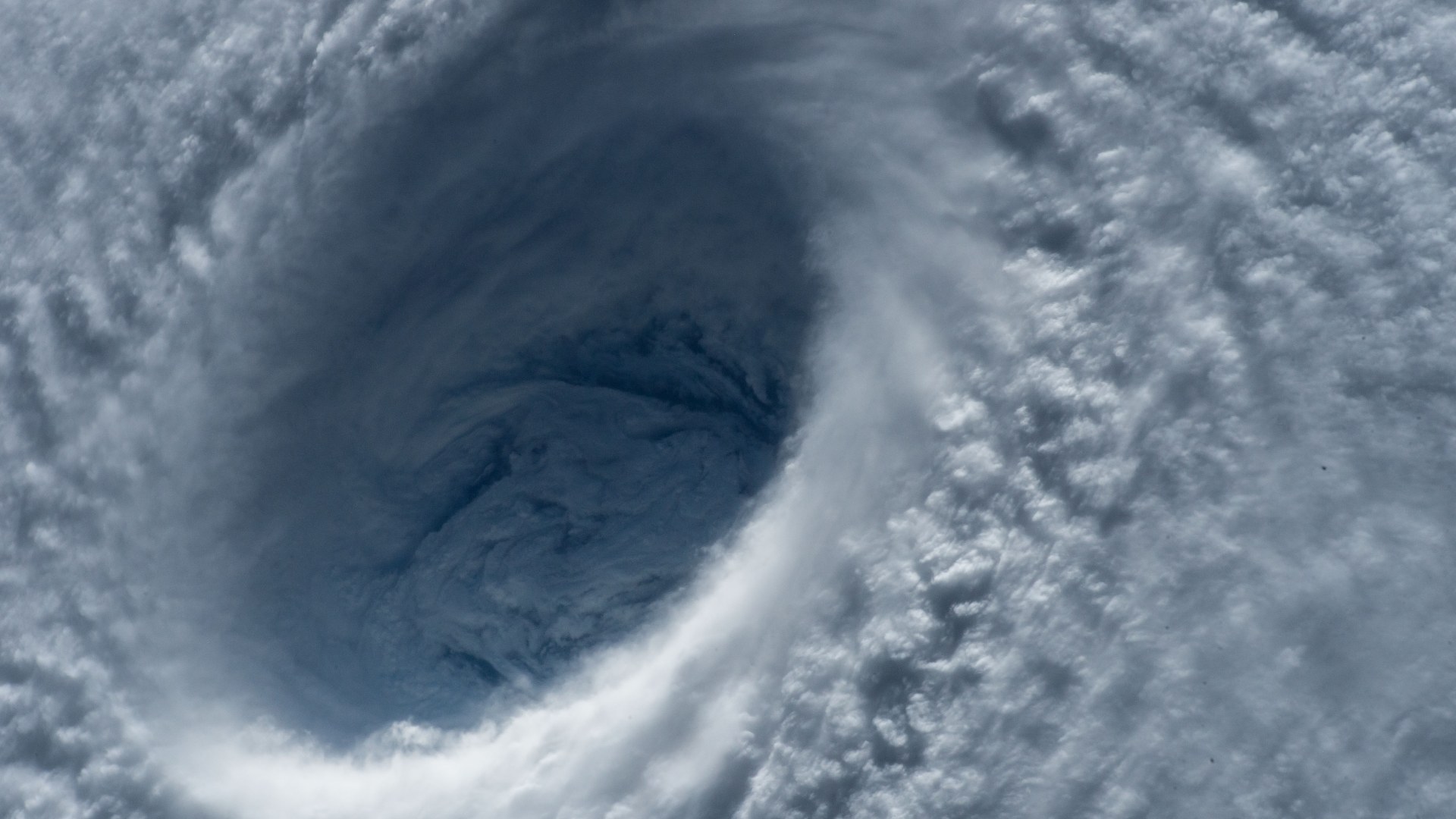 ISS Expedition 43 wide-angle view of a cavernous Western Pacific Category 5 super typhoon eye.