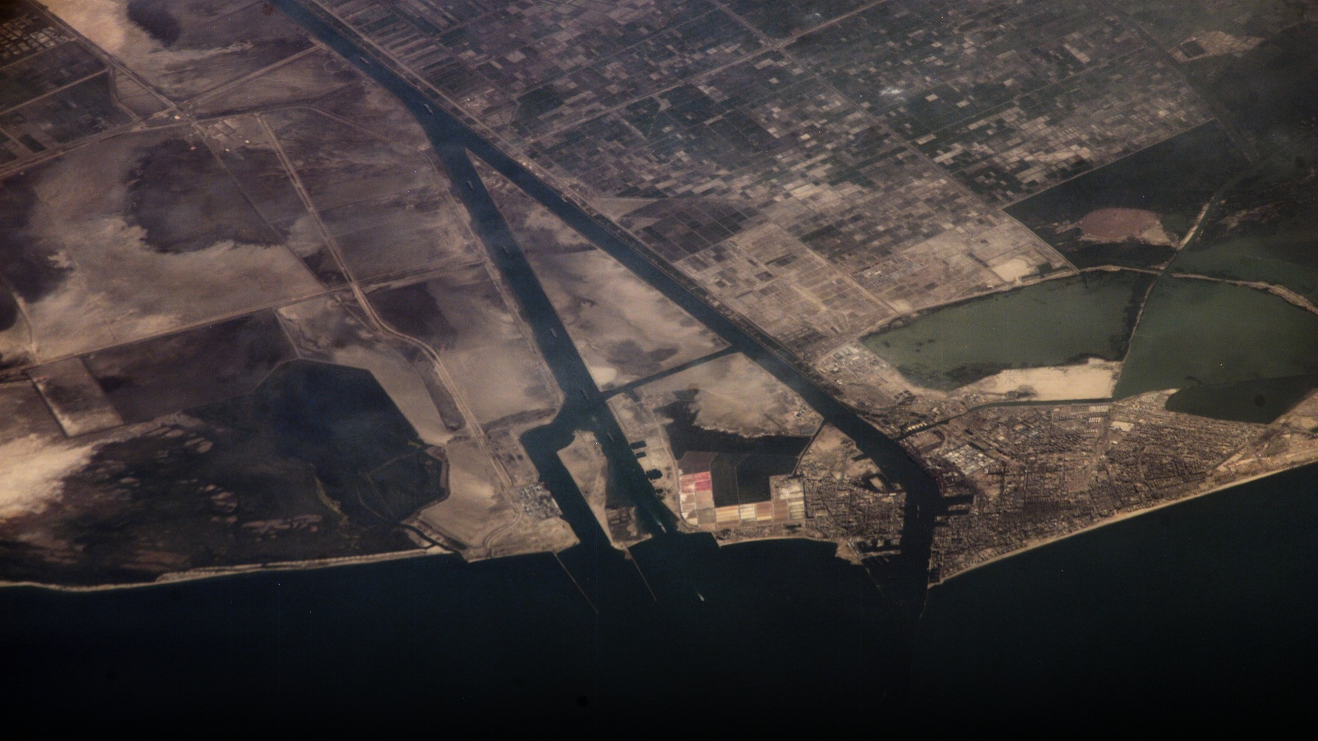 Orbital astronaut and satellite photography of Suez Canal.