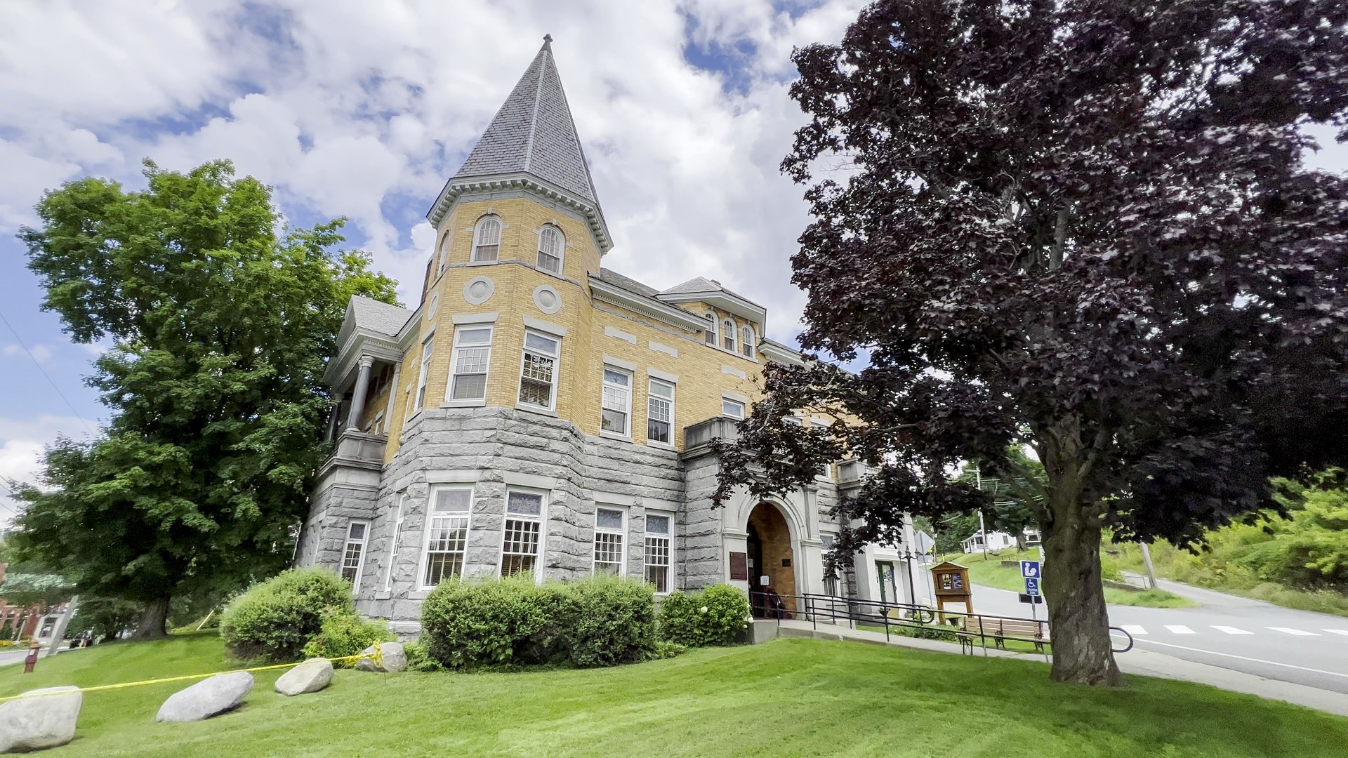 Landscape photograph of the historic Haskell Free Library and Opera House built directly across the US-Canada border in Derby Line and Stanstead.