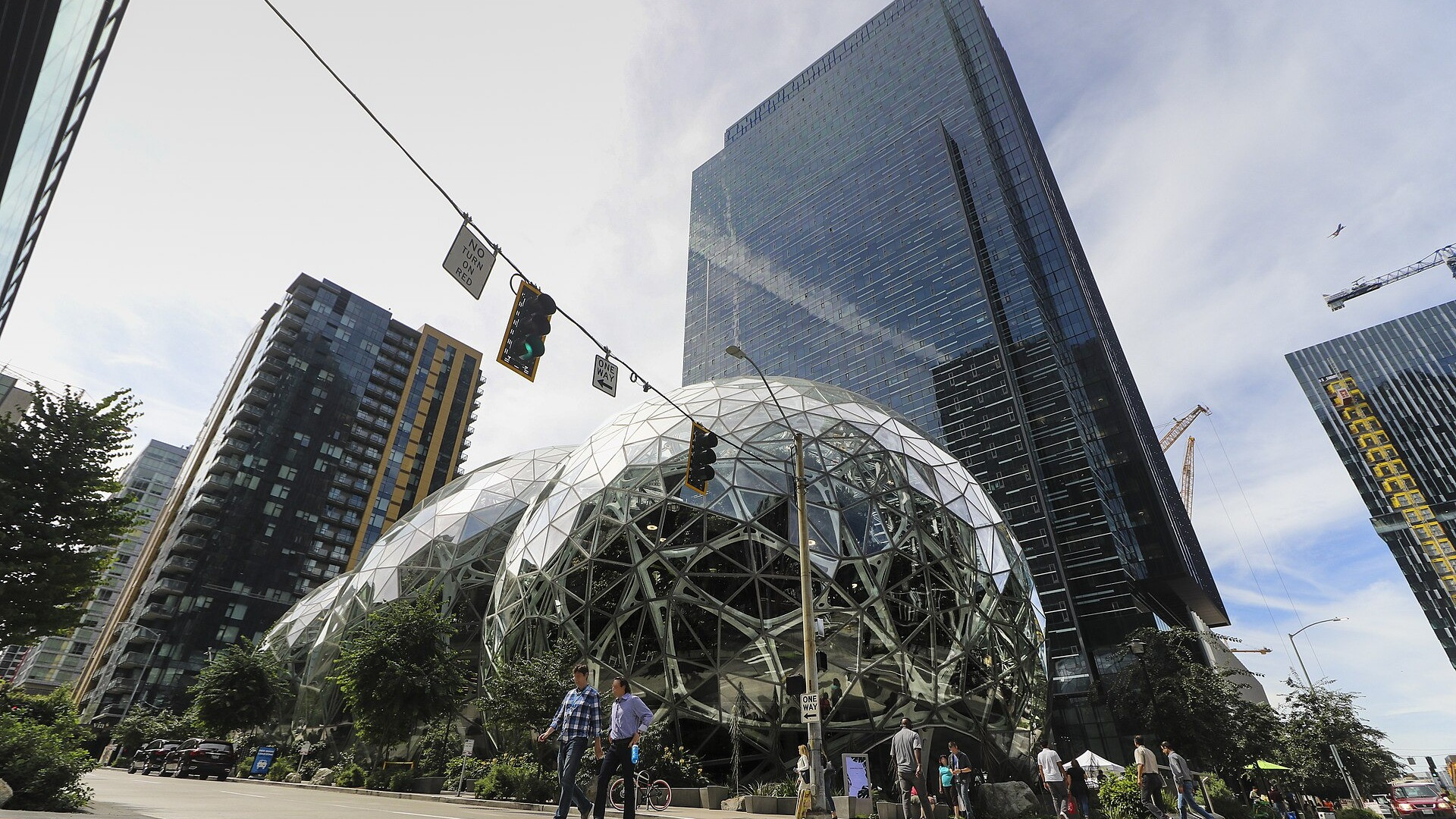Amazon founder Jeff Bezos alongside the iconic glass biospheres at Amazon's global headquarters in Seattle.