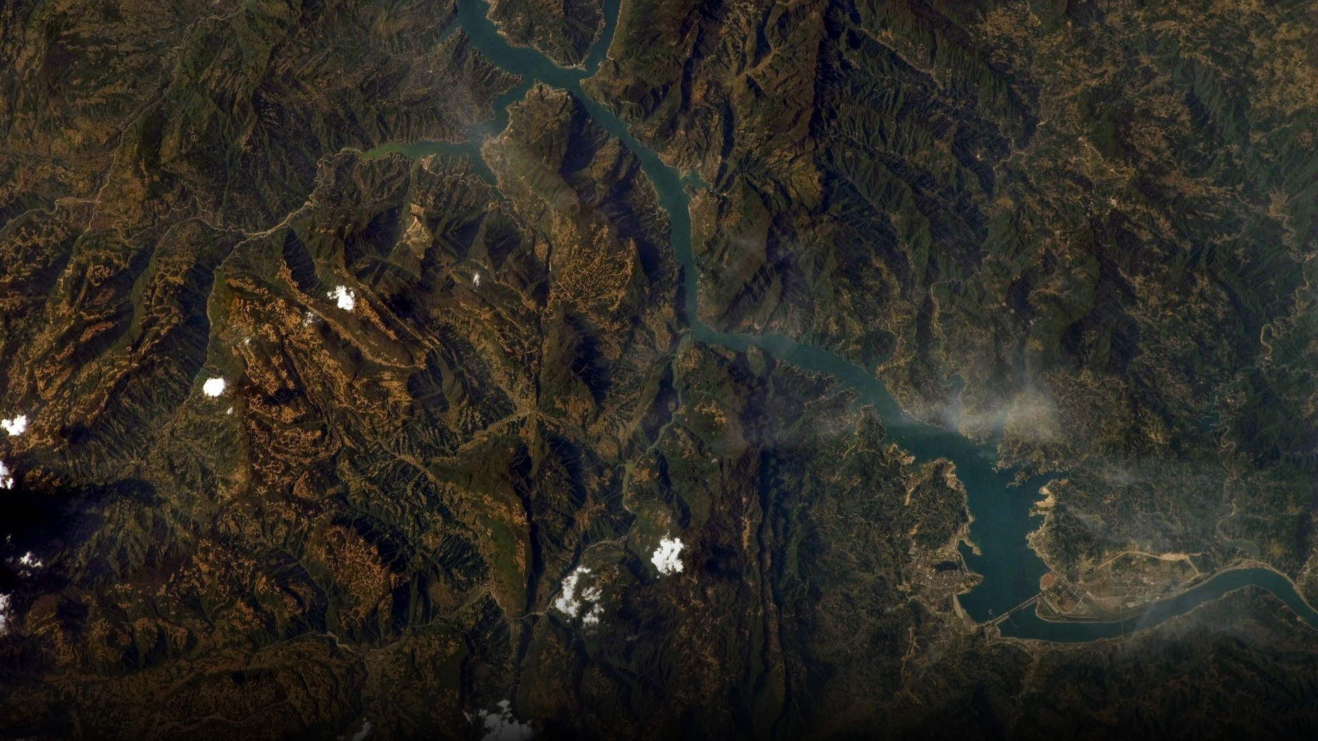 Orbital astronaut and satellite photography of Three Gorges Dam.