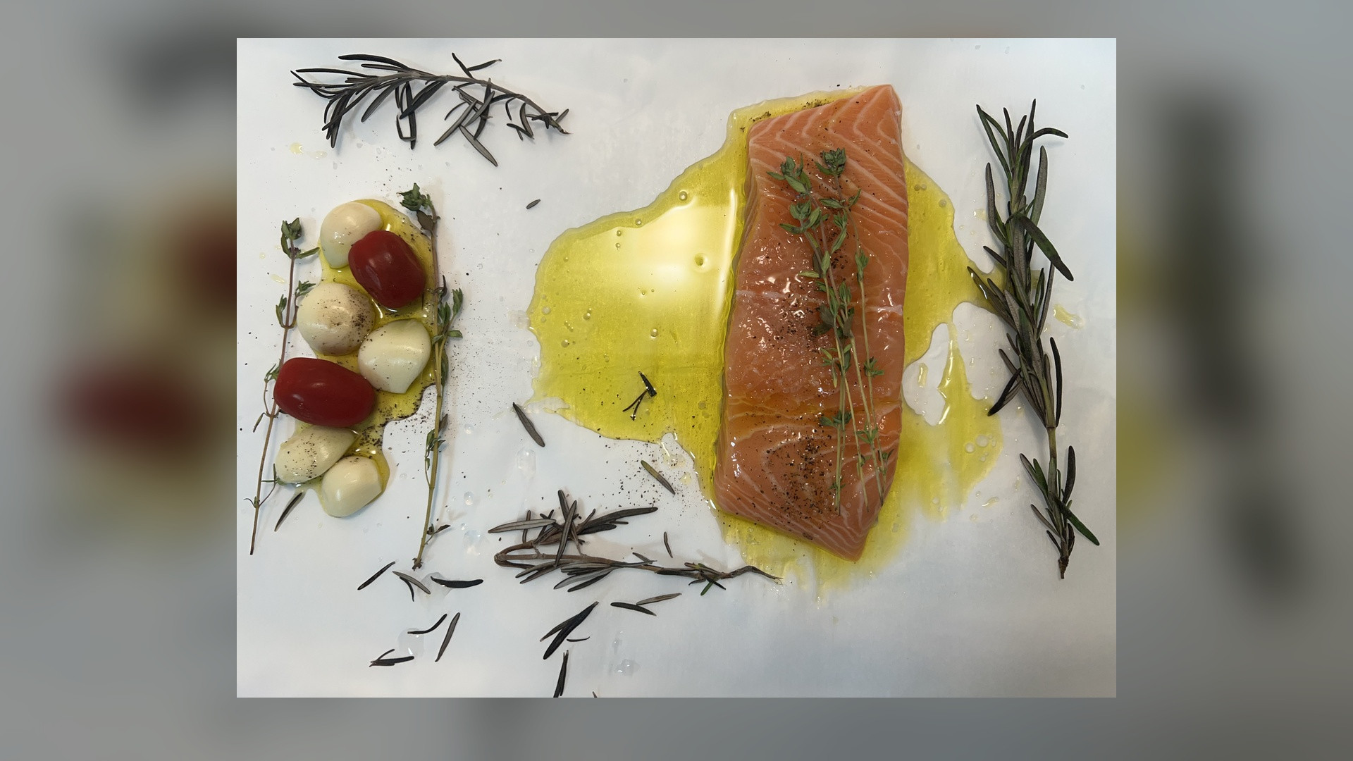 Fresh wild salmon fillet grilled to perfection with lemon and rosemary.