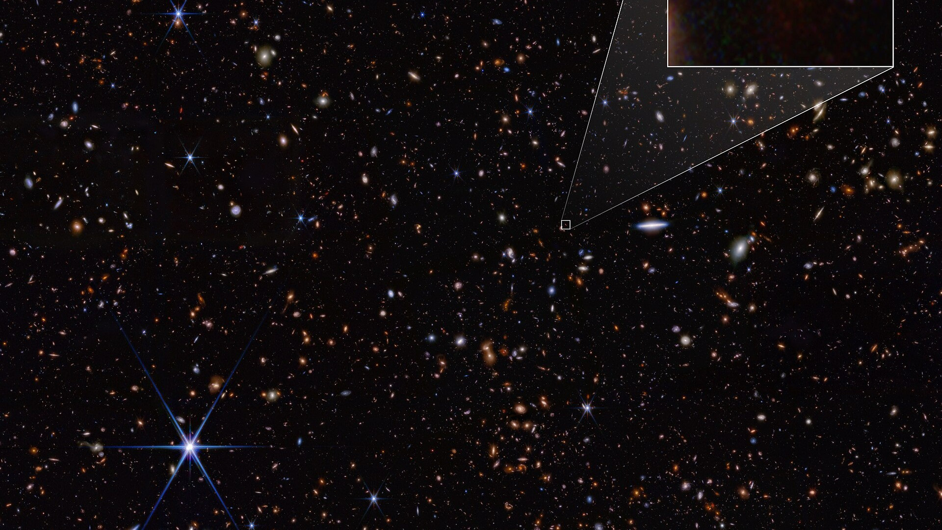 Annotated pullout observation of JADES-GS-z14-0, the most distant known galaxy in the universe.