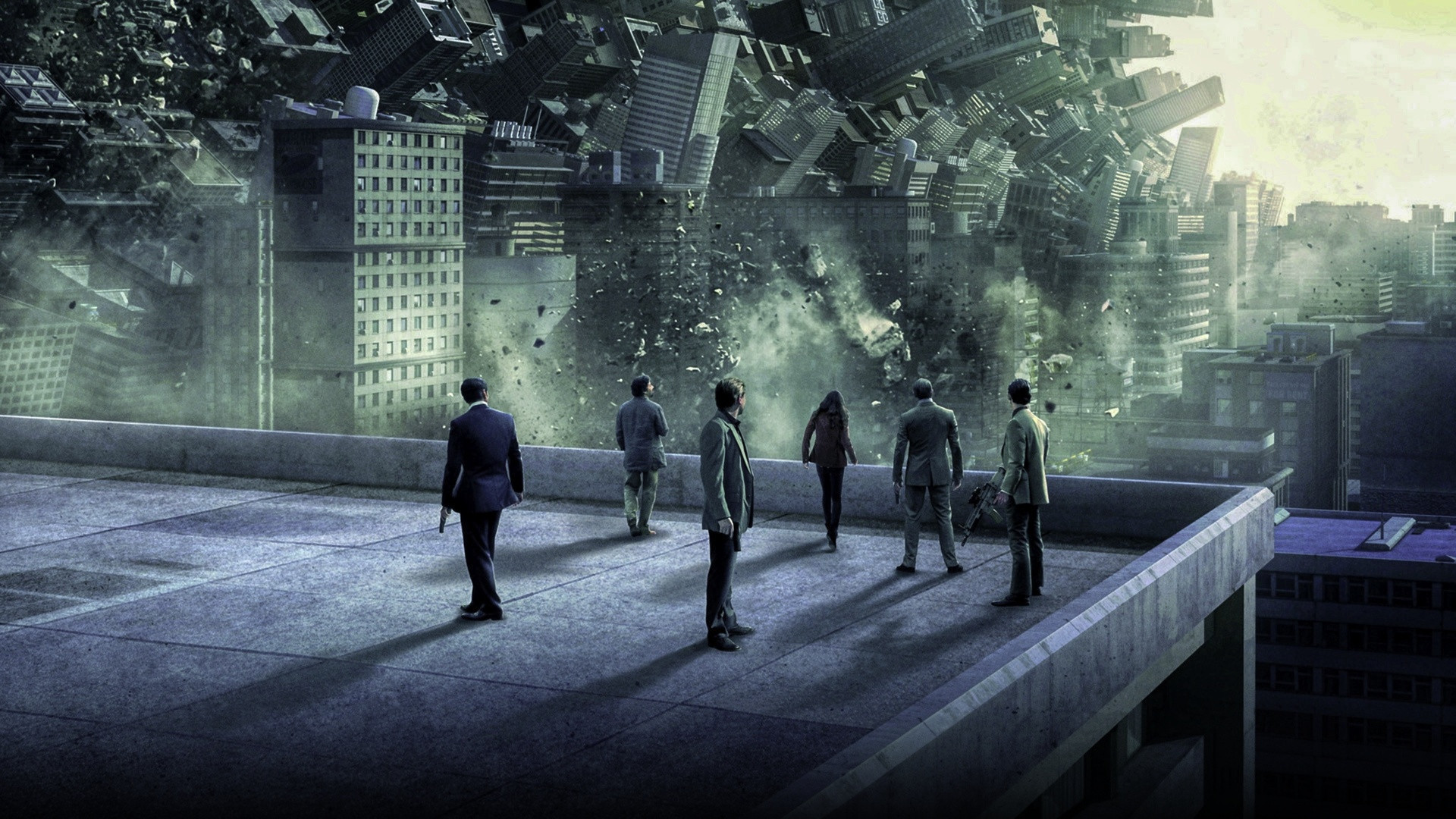 The dream architecture team on a rooftop watching the cityscape fold up into limbo in Inception.