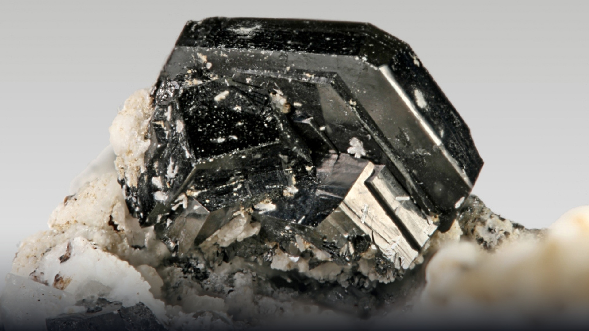Metallic black ilmenite titanium mineral rock specimen.