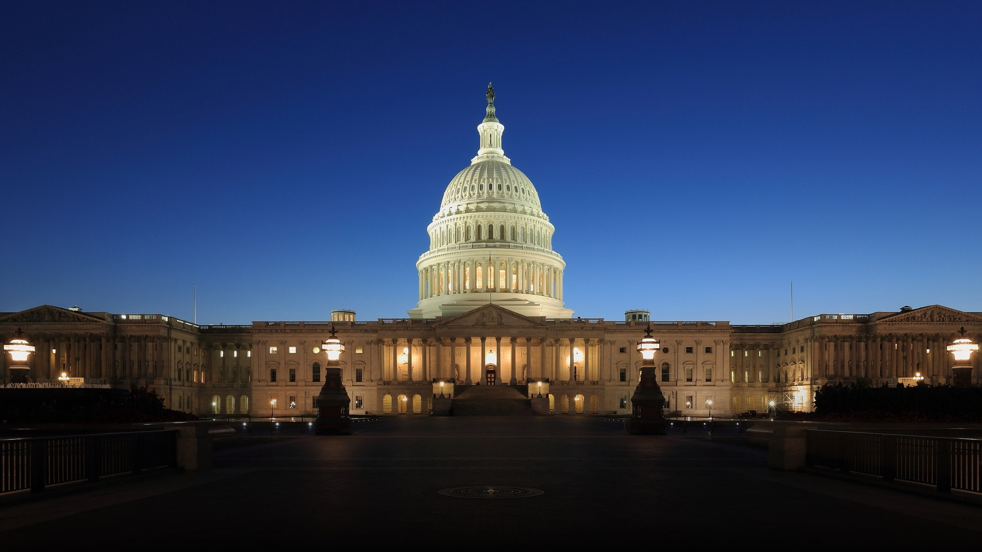 The United States Capitol illuminated at dusk in Washington, D.C.