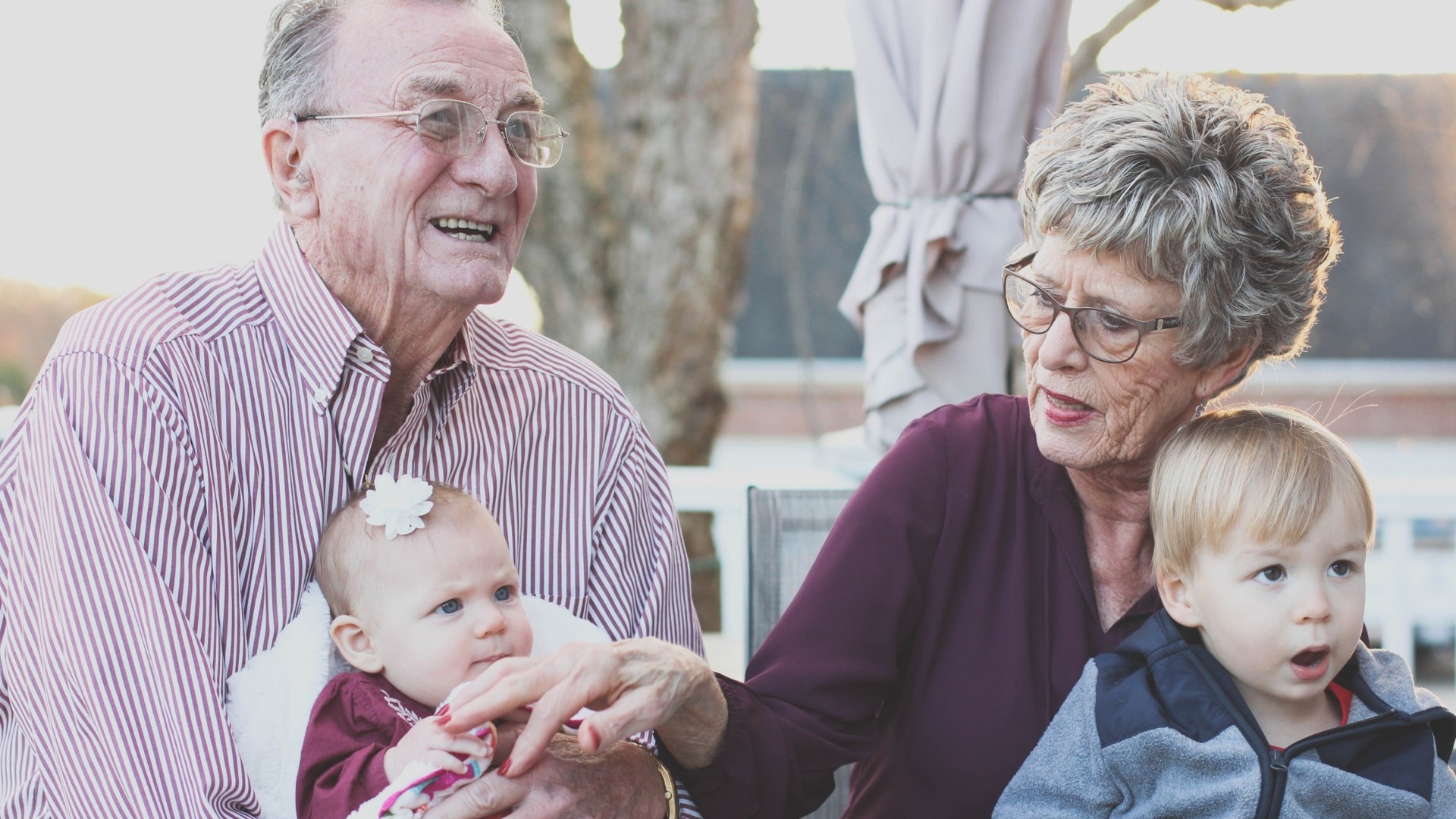 Grandparents spending quality time together with their grandchild.