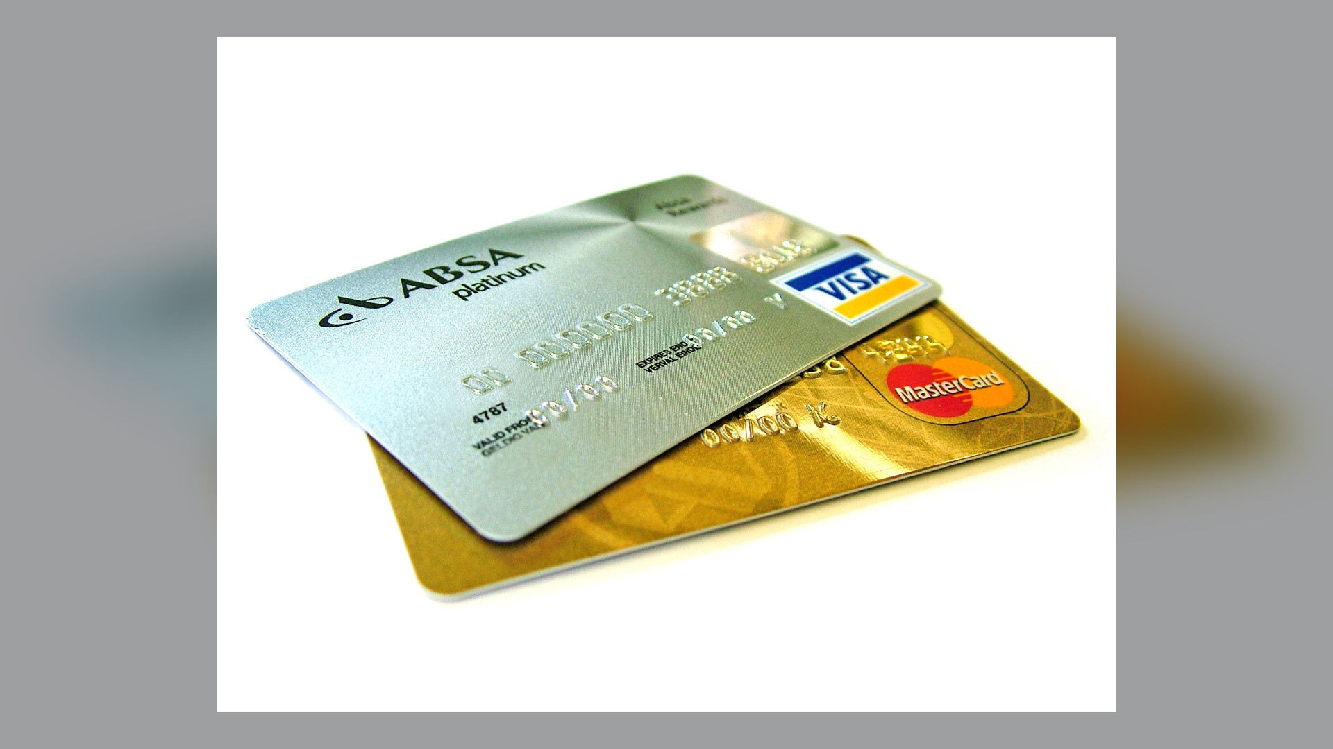 Close-up of modern payment credit cards showing EMV chip details.