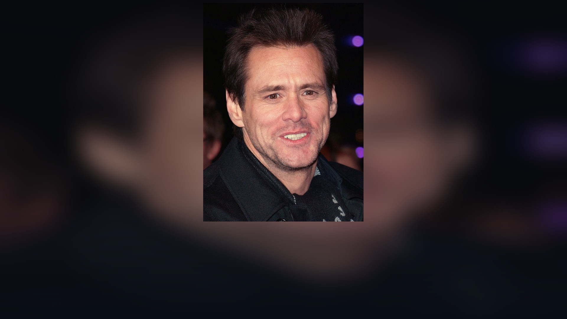 Jim Carrey speaking at an event in 2008.