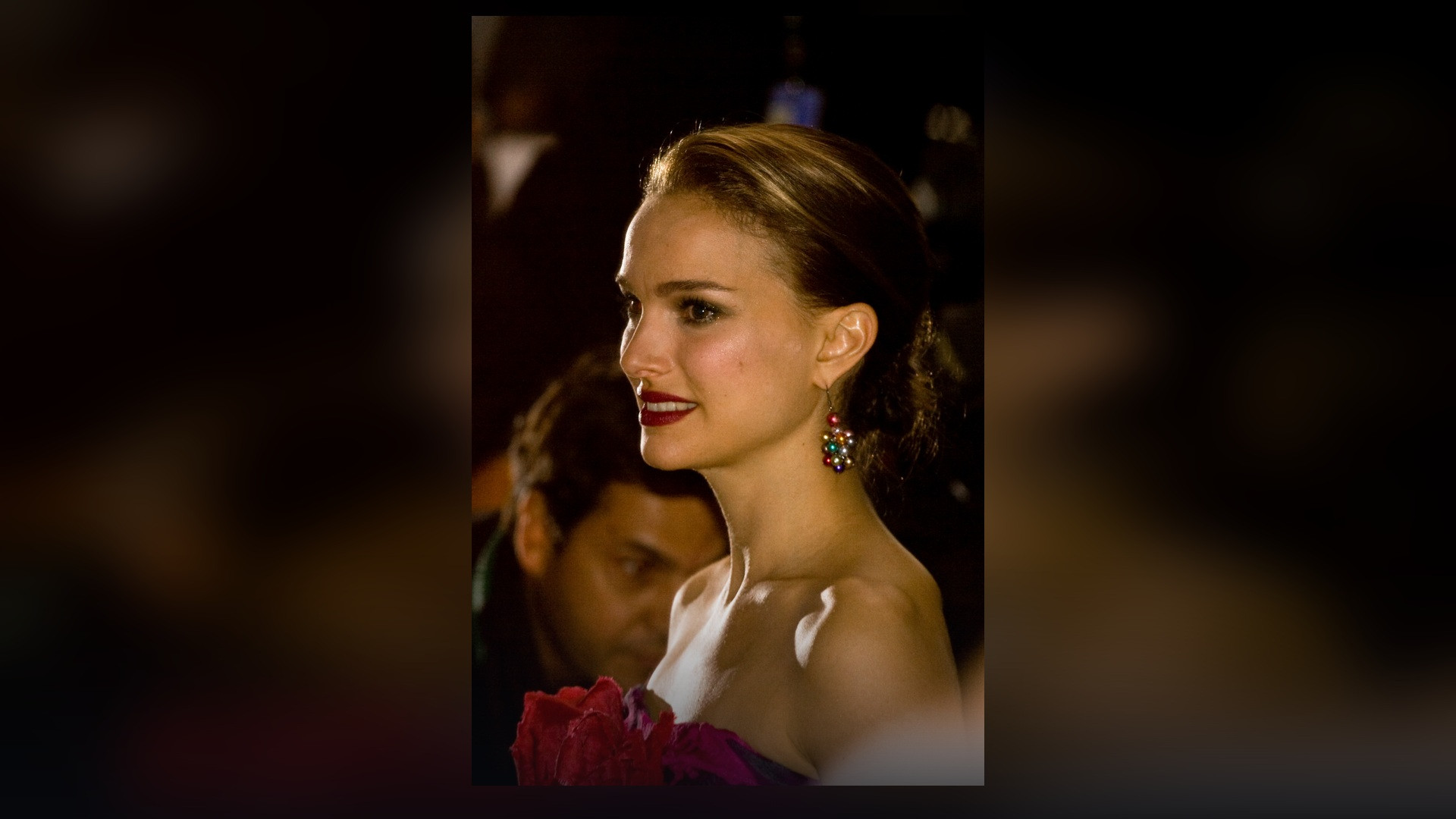 Portrait of Natalie Portman smiling on the red carpet at the Toronto International Film Festival
