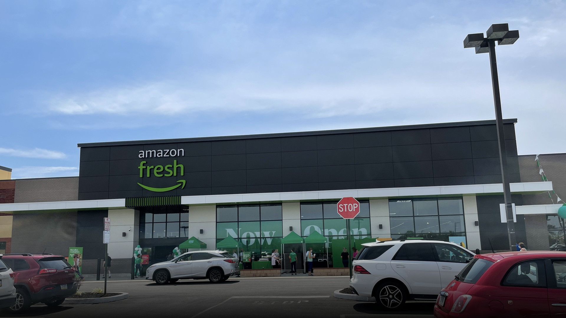 Photograph of Amazon Fresh supermarket storefront celebrating family grocery excellence.