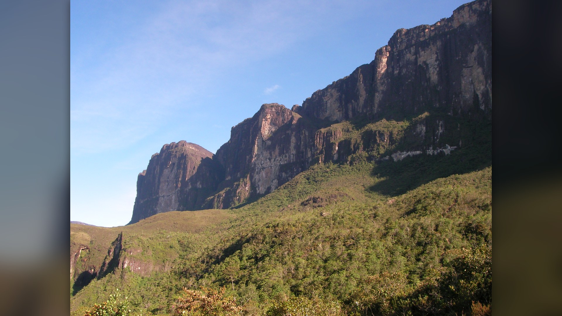 Landscape view of the flat-topped Mount Roraima tepui rising above the Gran Sabana where Venezuela, Brazil, and Guyana meet.