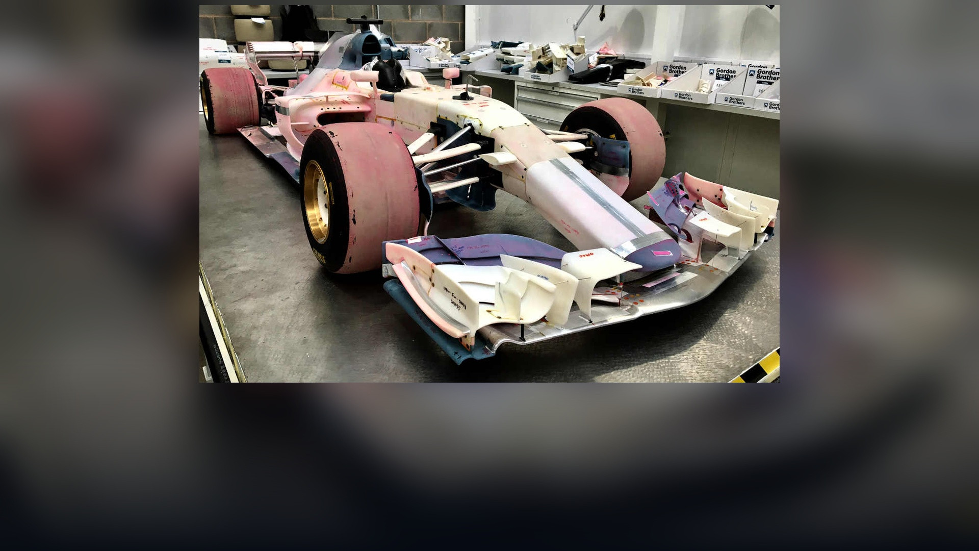 Formula One 60% wind tunnel model showcasing complex aerodynamic front and rear wings.