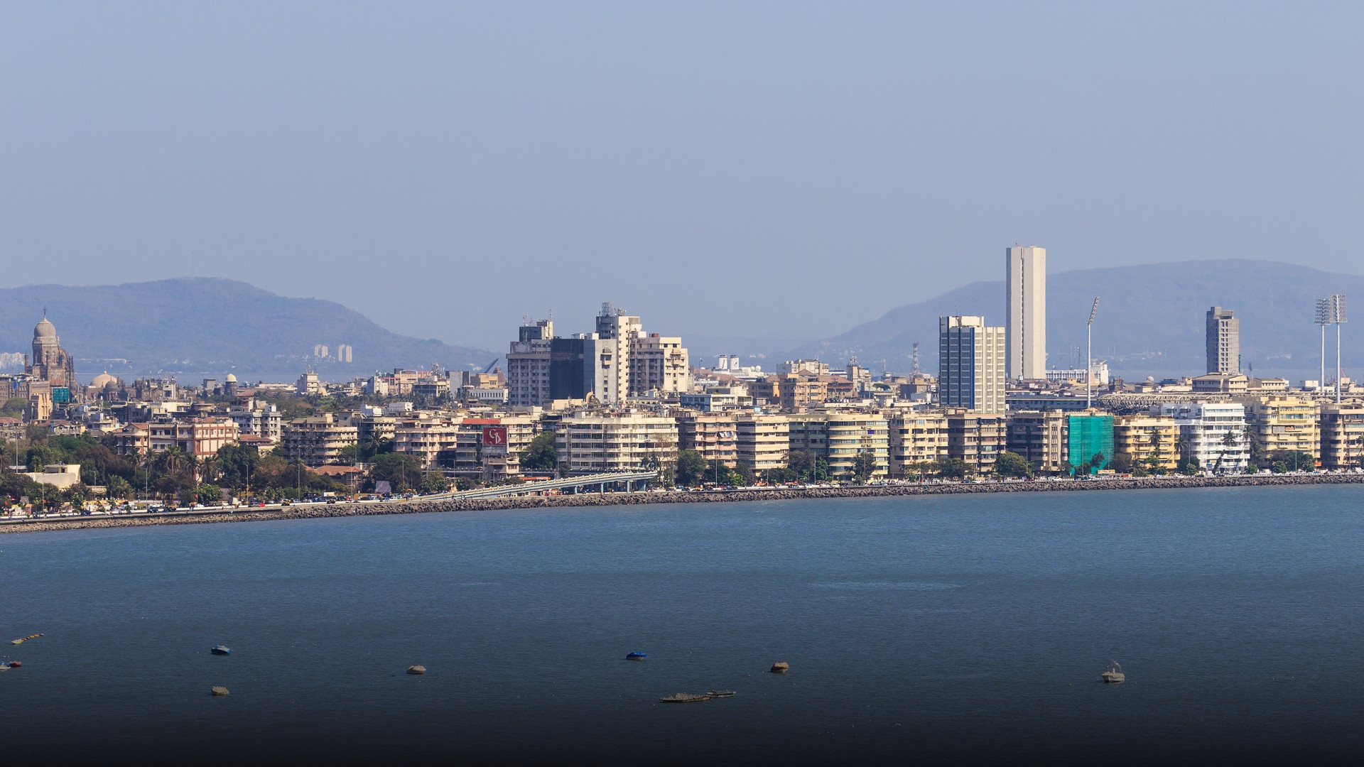 Marine Drive and Mumbai coastal skyline curving along the Arabian Sea.