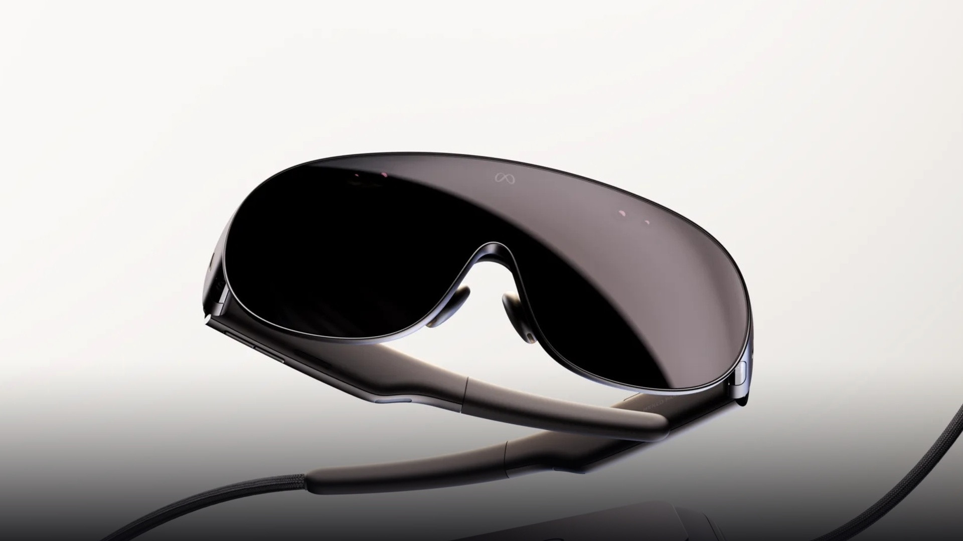 Angled perspective showing the open periphery beneath the visor lens and sleek temple clearance.