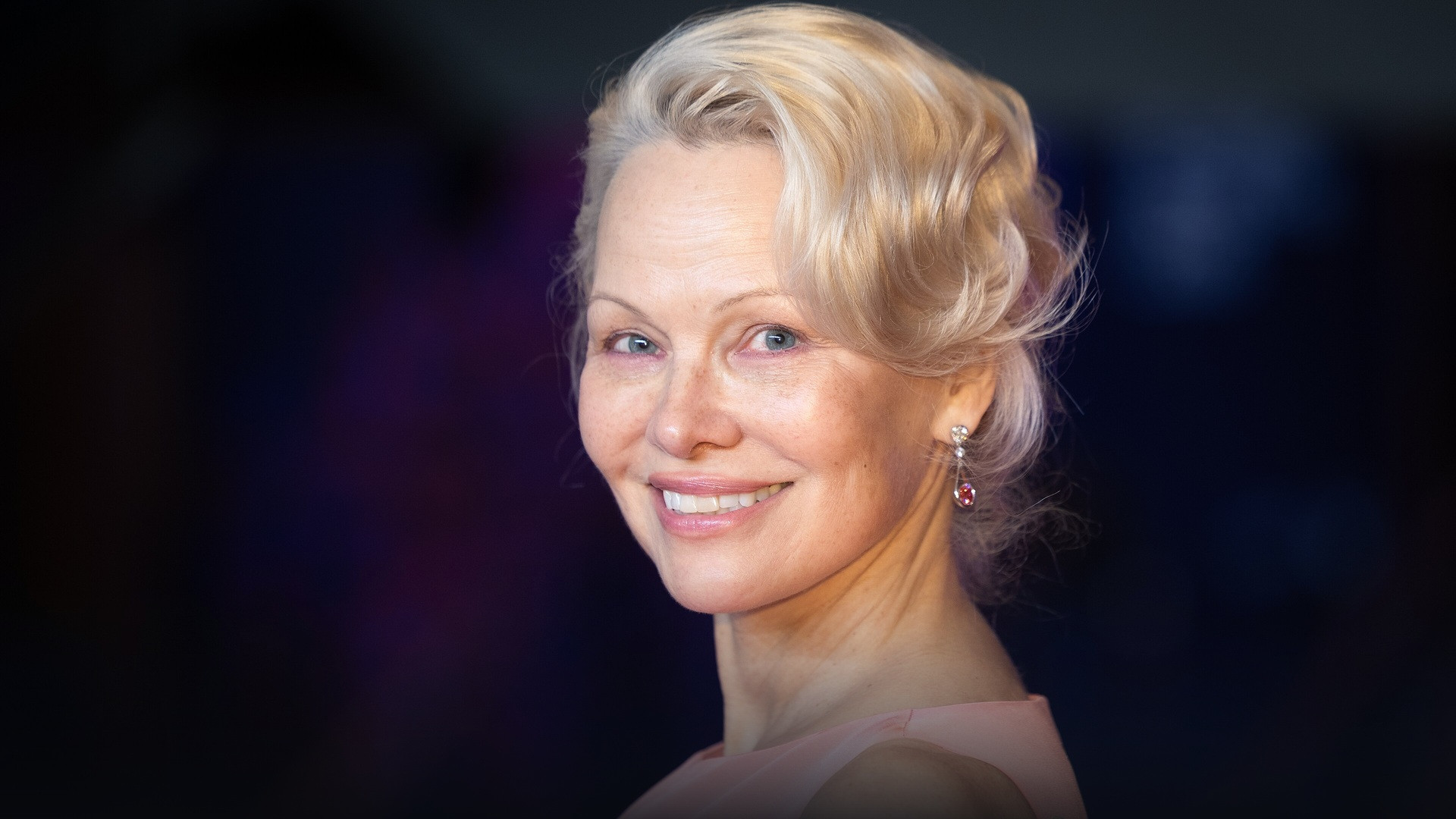 Pamela Anderson posing at a European film festival