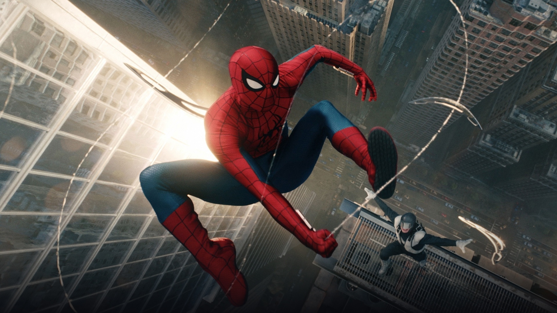 Spider-Man diving dynamically between Manhattan skyscrapers in his classic red-and-blue suit with webs spiraling around him.