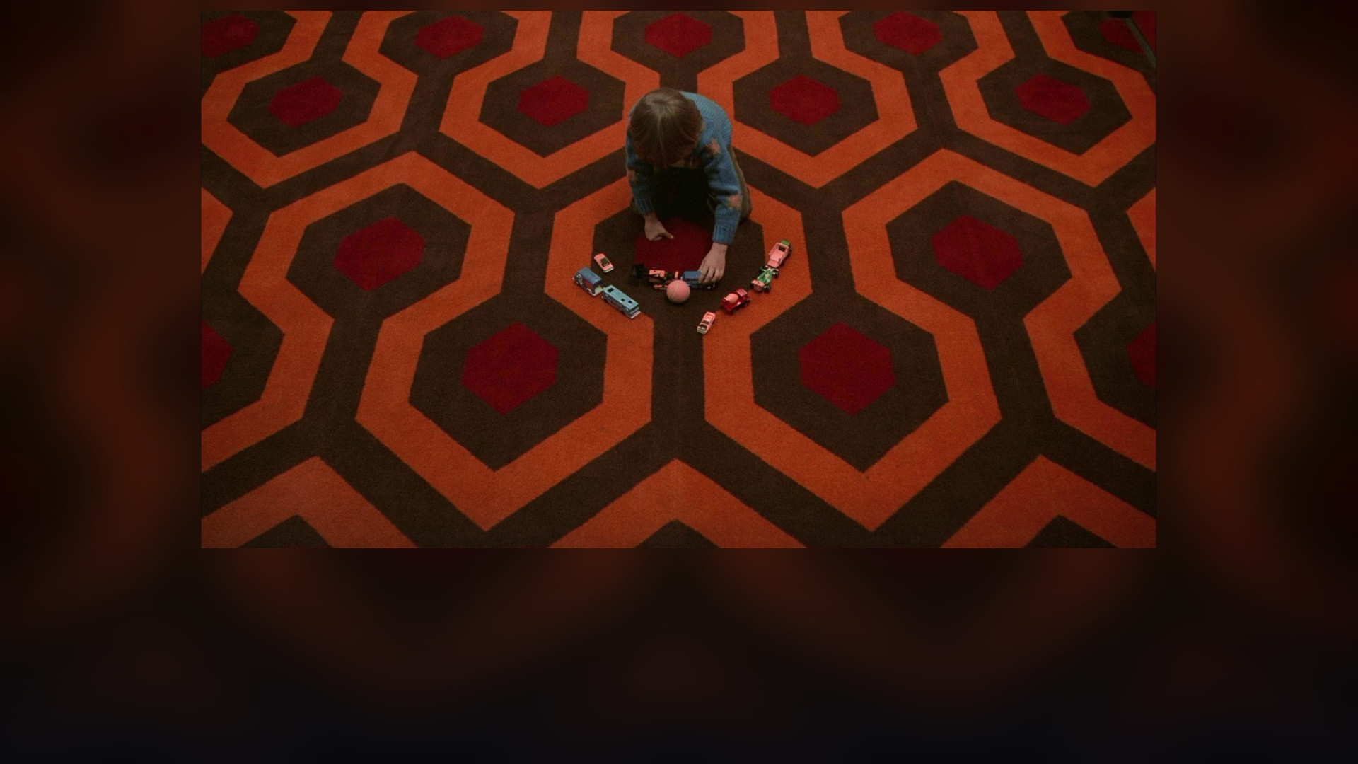 Jack Nicholson's manic grin breaking through the bathroom door in The Shining.