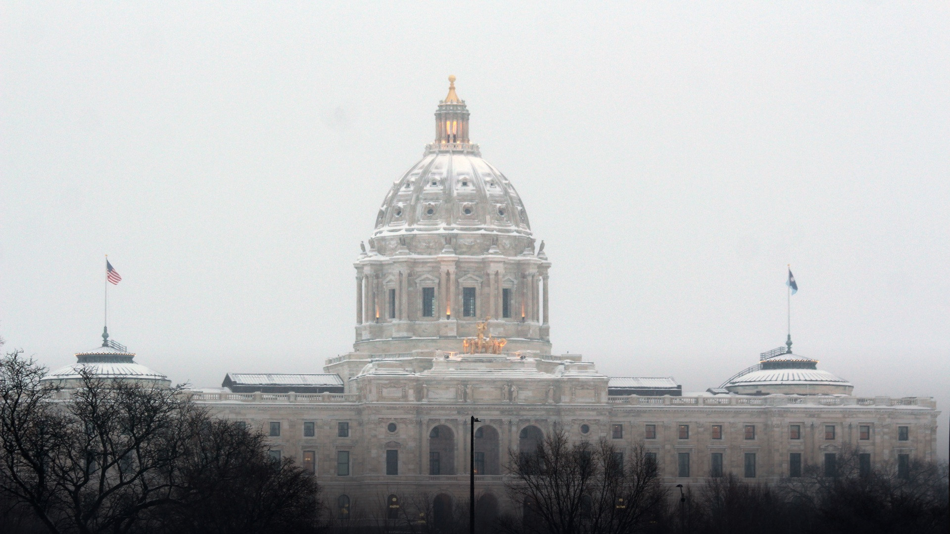 The Minnesota State Capitol building in Saint Paul blanketed in thick winter snow.