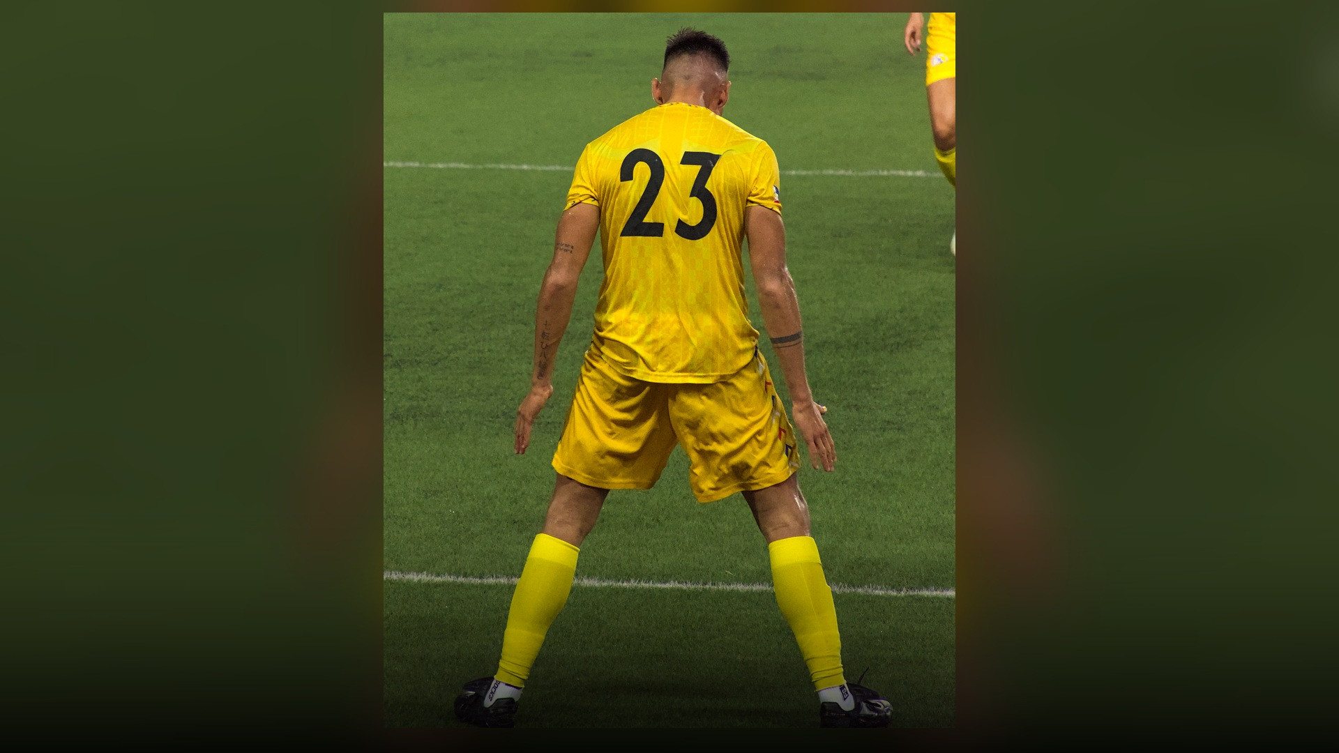Cristiano Ronaldo in full match motion on the pitch.