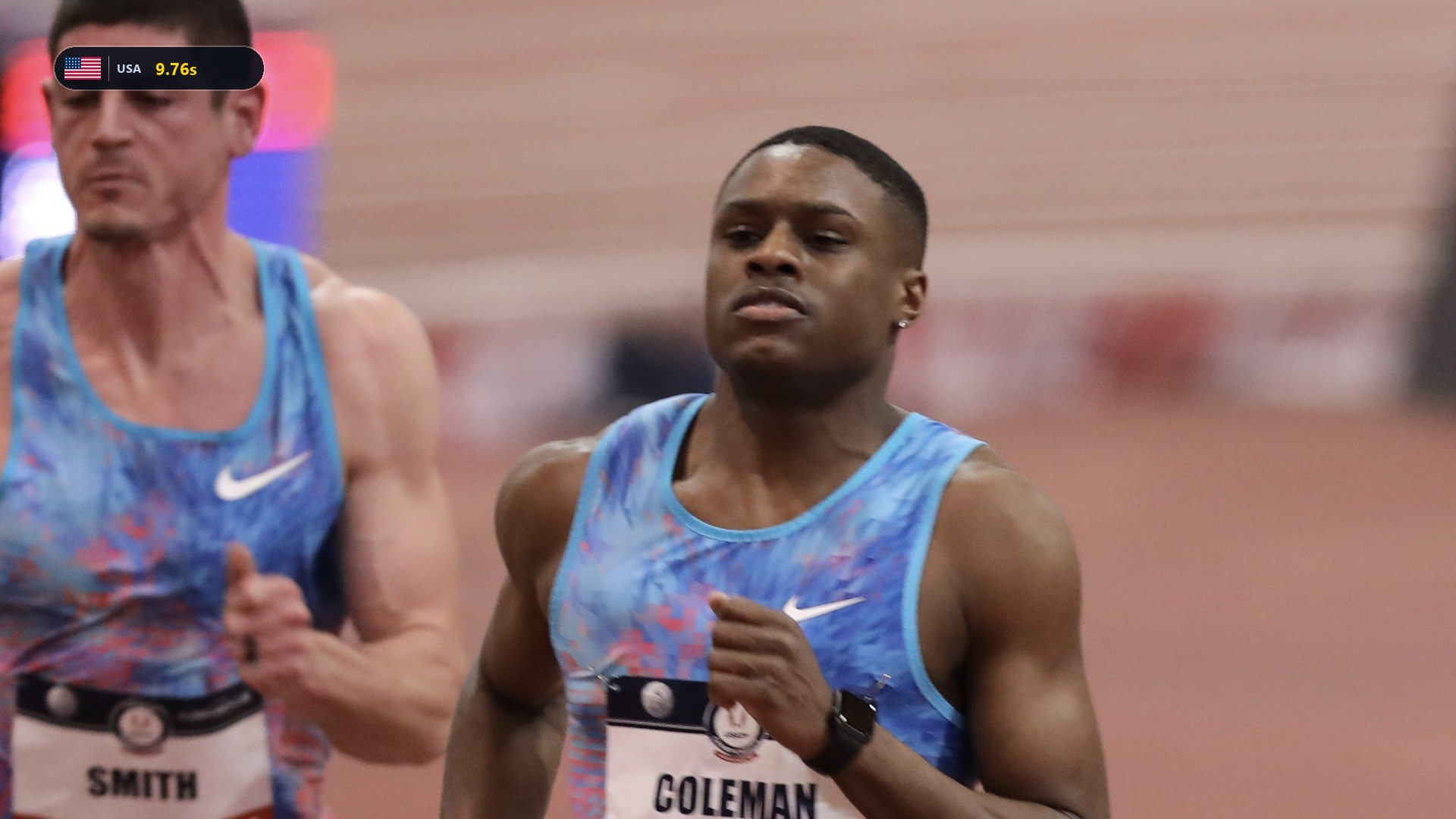 Christian Coleman blasting out of the blocks in his USA racing uniform.
