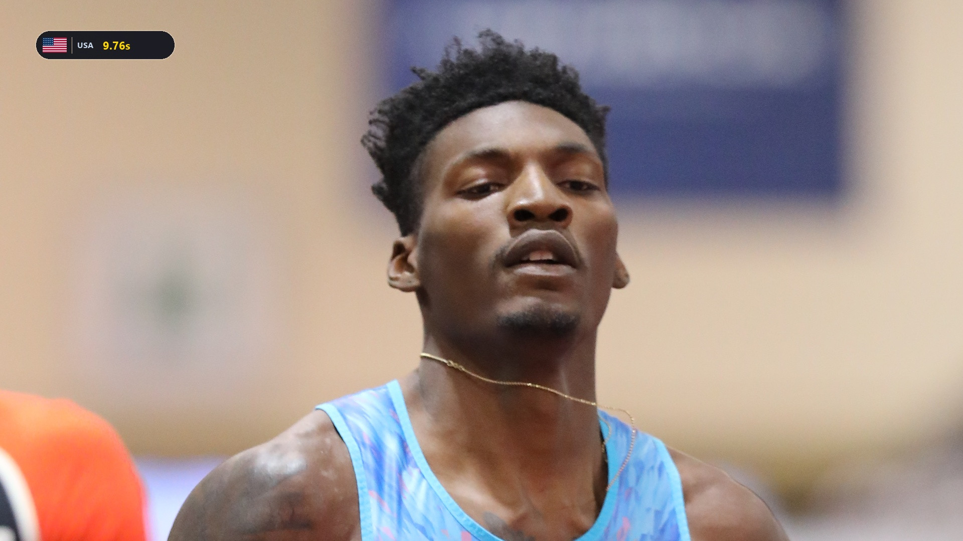 Fred Kerley competing intensely in his USA sprint uniform.