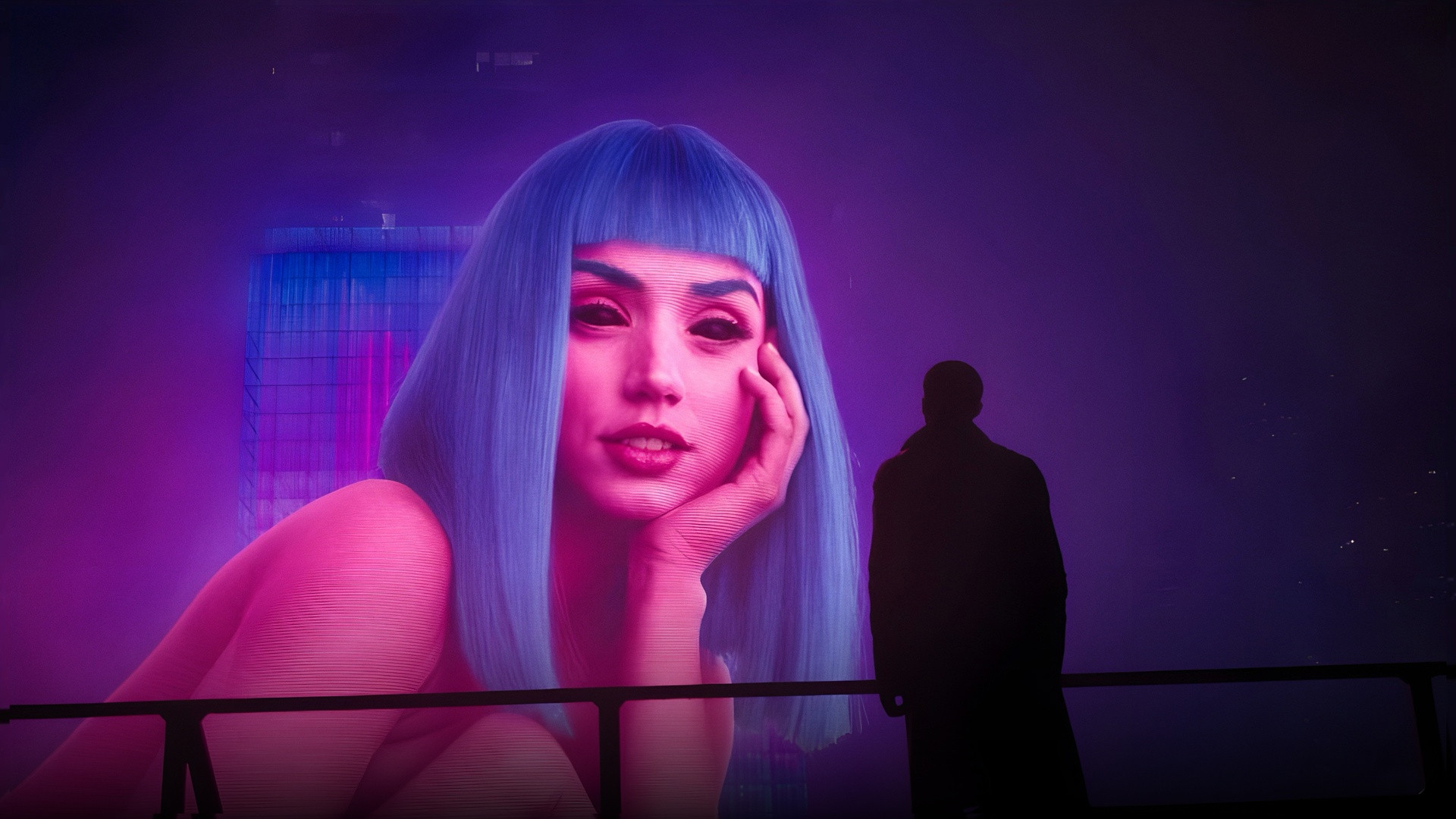 Giant neon holographic Joi leaning down toward Officer K standing on the rain-soaked walkway in Blade Runner 2049.