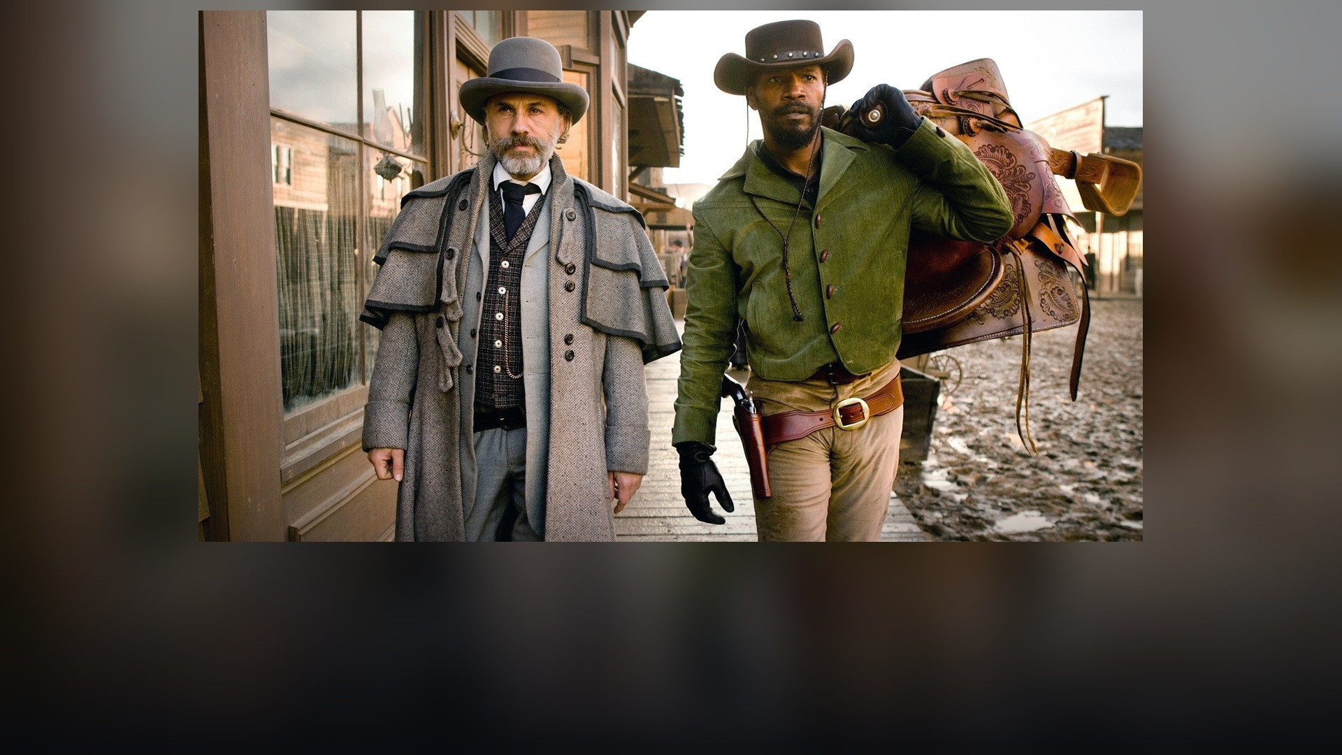 Leonardo DiCaprio as Calvin Candie at the dining table in Django Unchained.