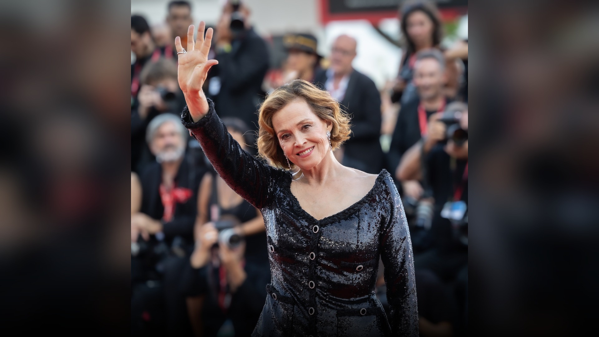 High-resolution portrait photograph of Sigourney Weaver celebrating academic achievement.